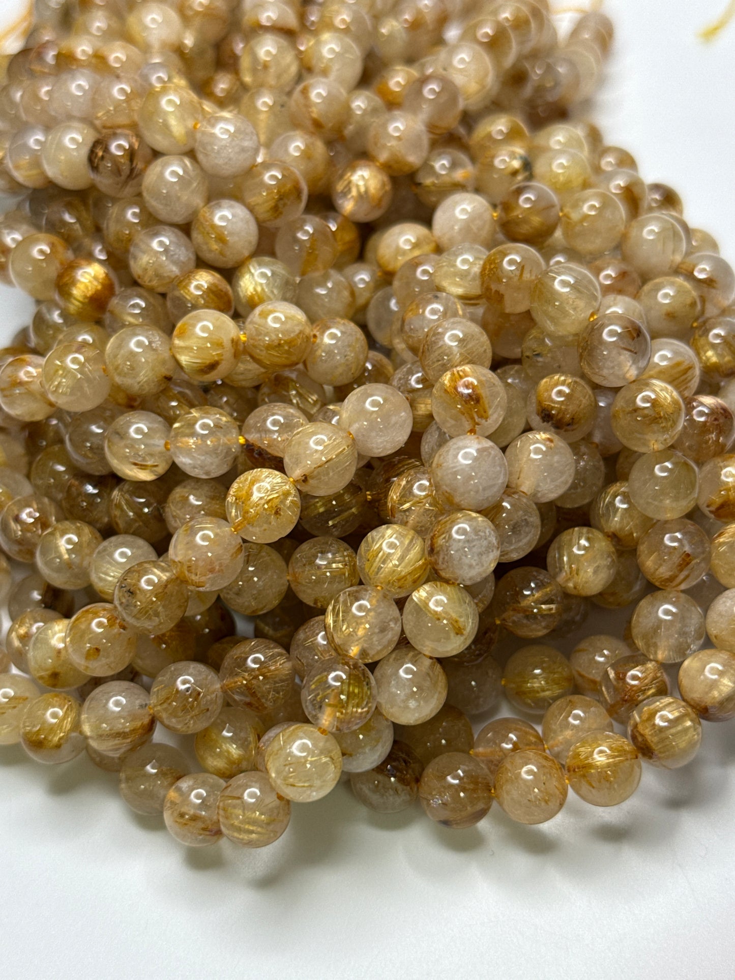 8mm Golden Rutilated Quartz Round Smooth.