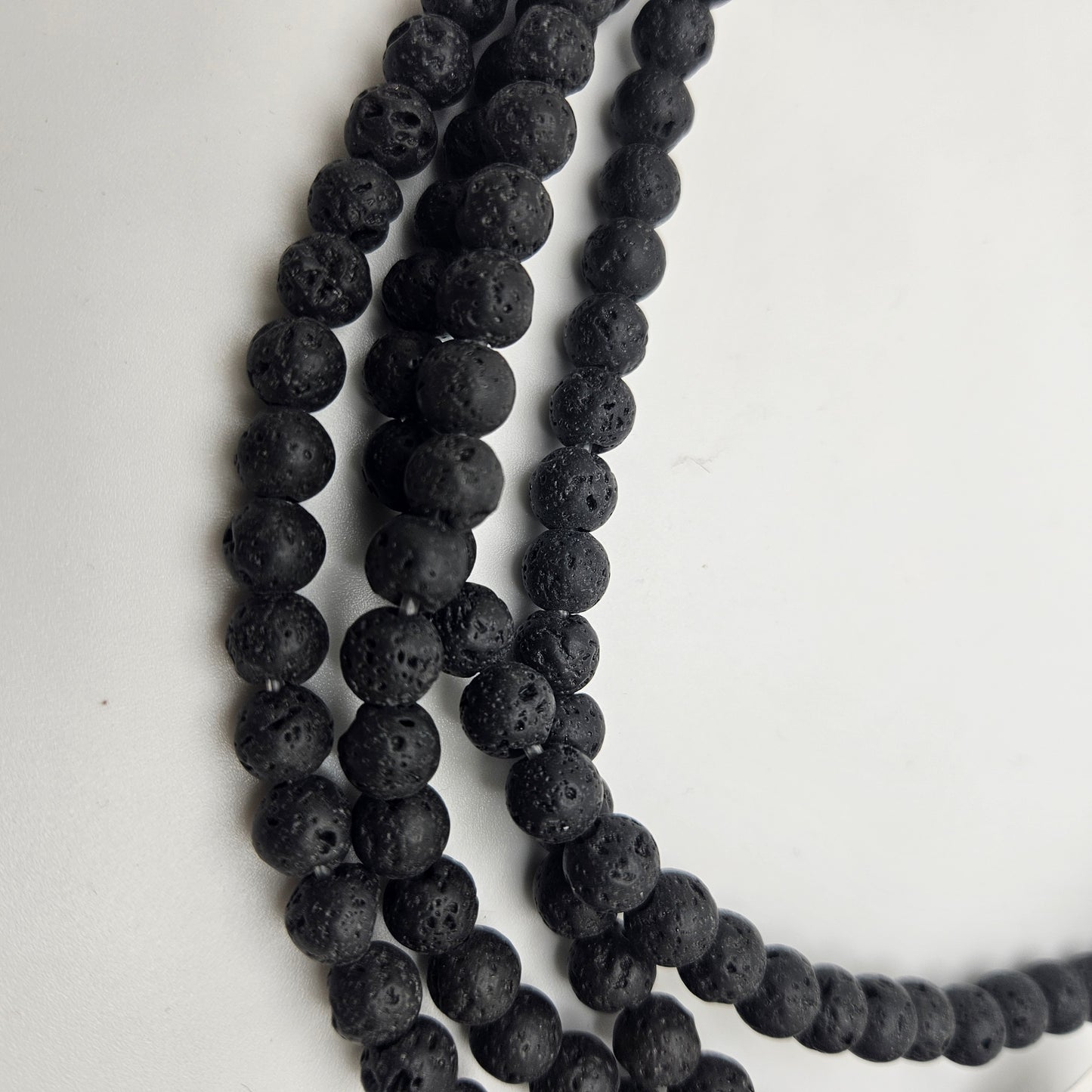 8mm Lava Stone Large Hole Round Bead Strand.