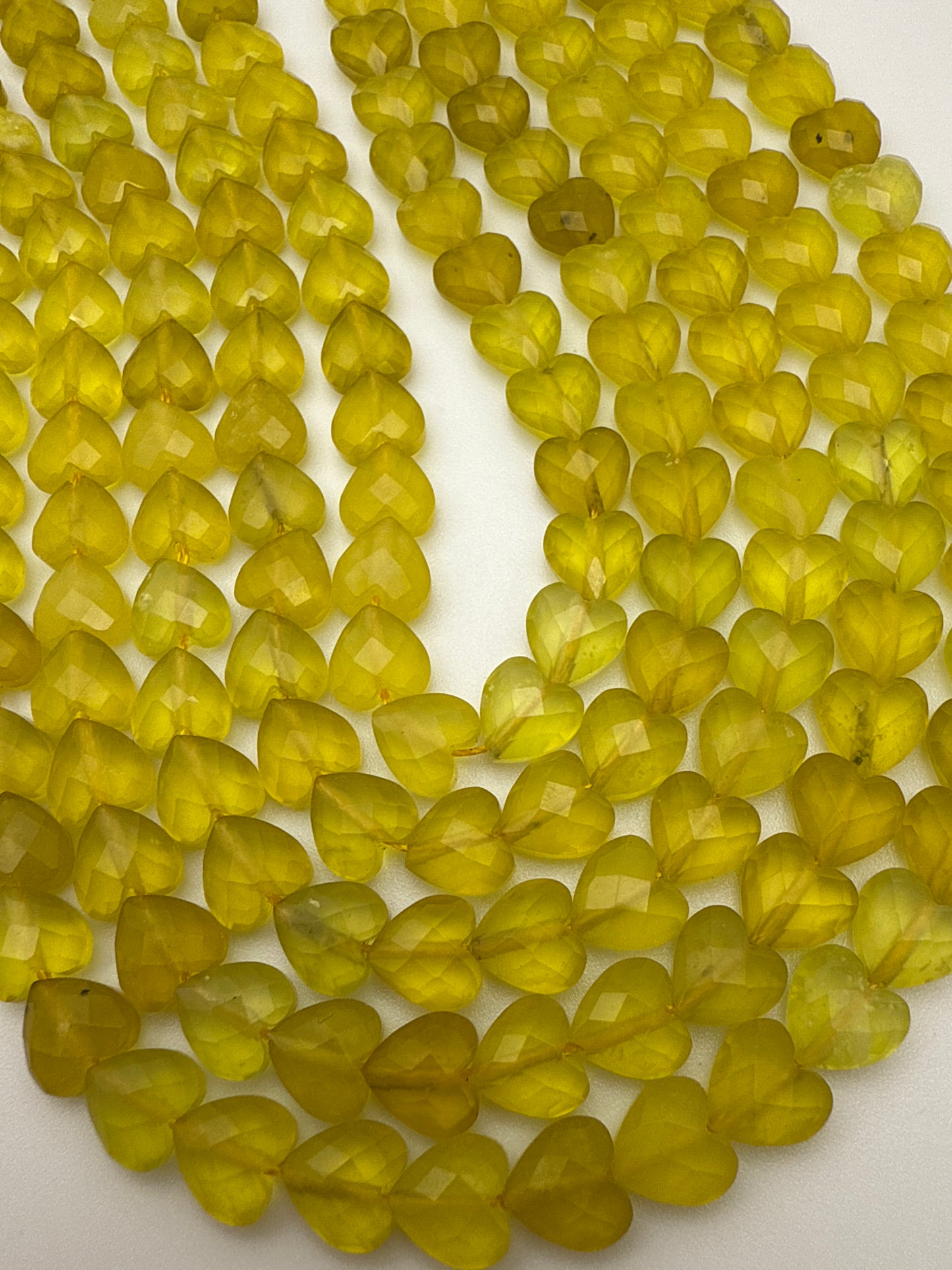 8mm Olivine Jade Faceted Heart Bead Strand.