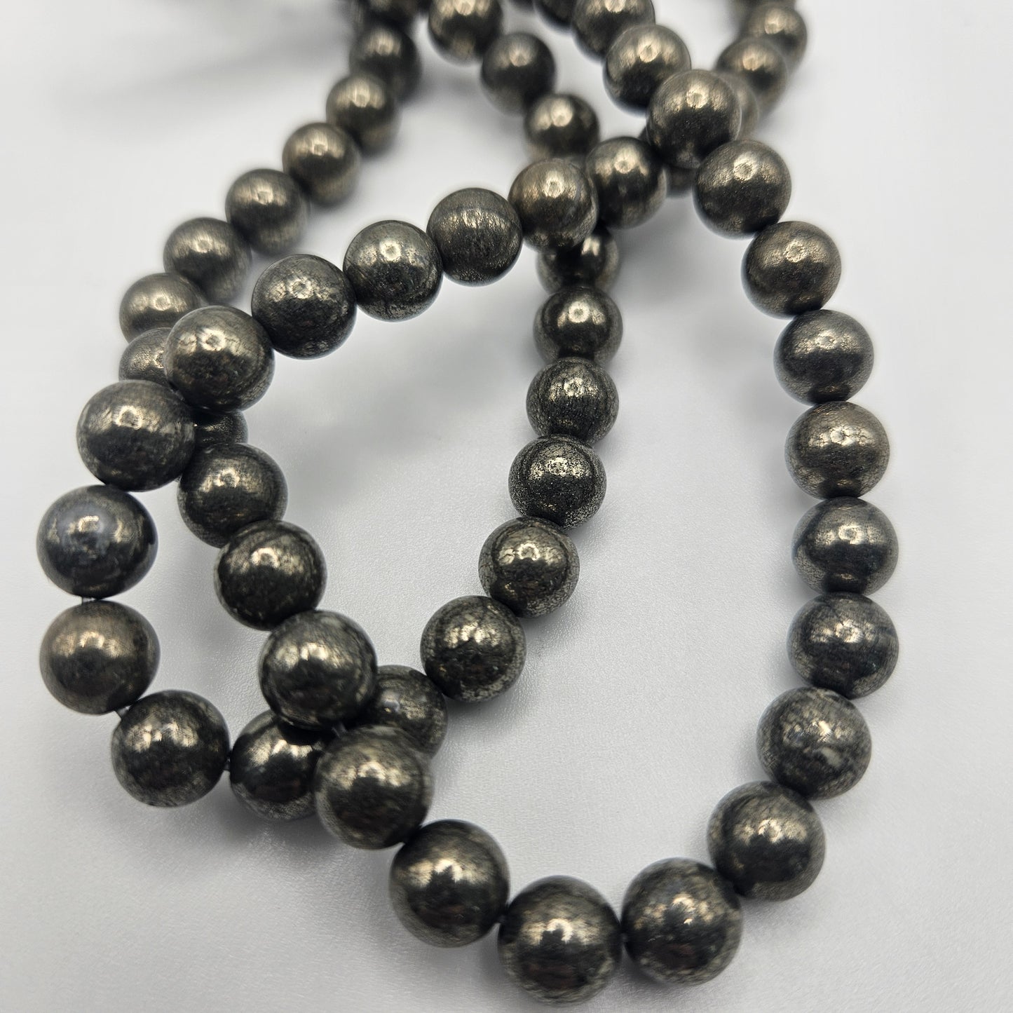 8mm Pyrite Round Bead Strand.