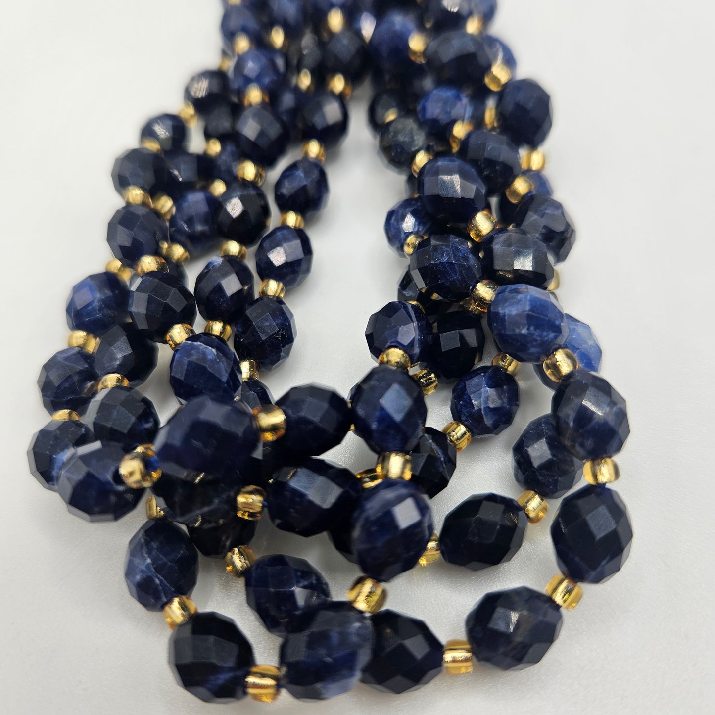 8mm Sodalite Faceted Oval Bead Strand.