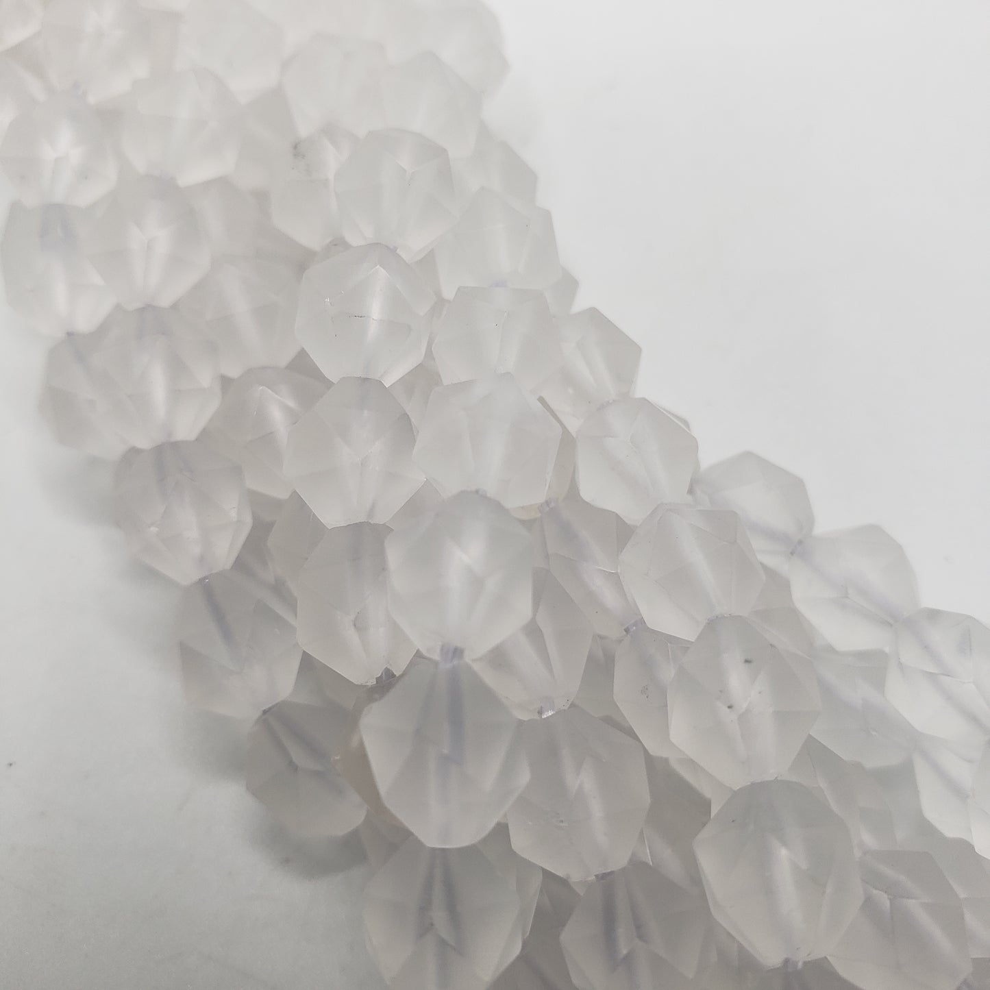 8mm Star Cut Clear Quartz Matte Bead Strand.