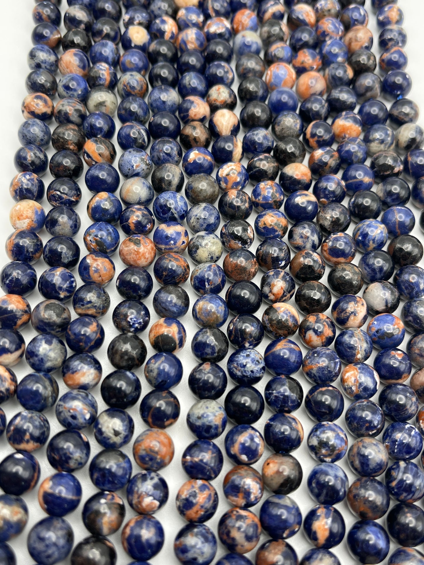 8mm Sunset Sodalite Round Smooth Bead Strand.