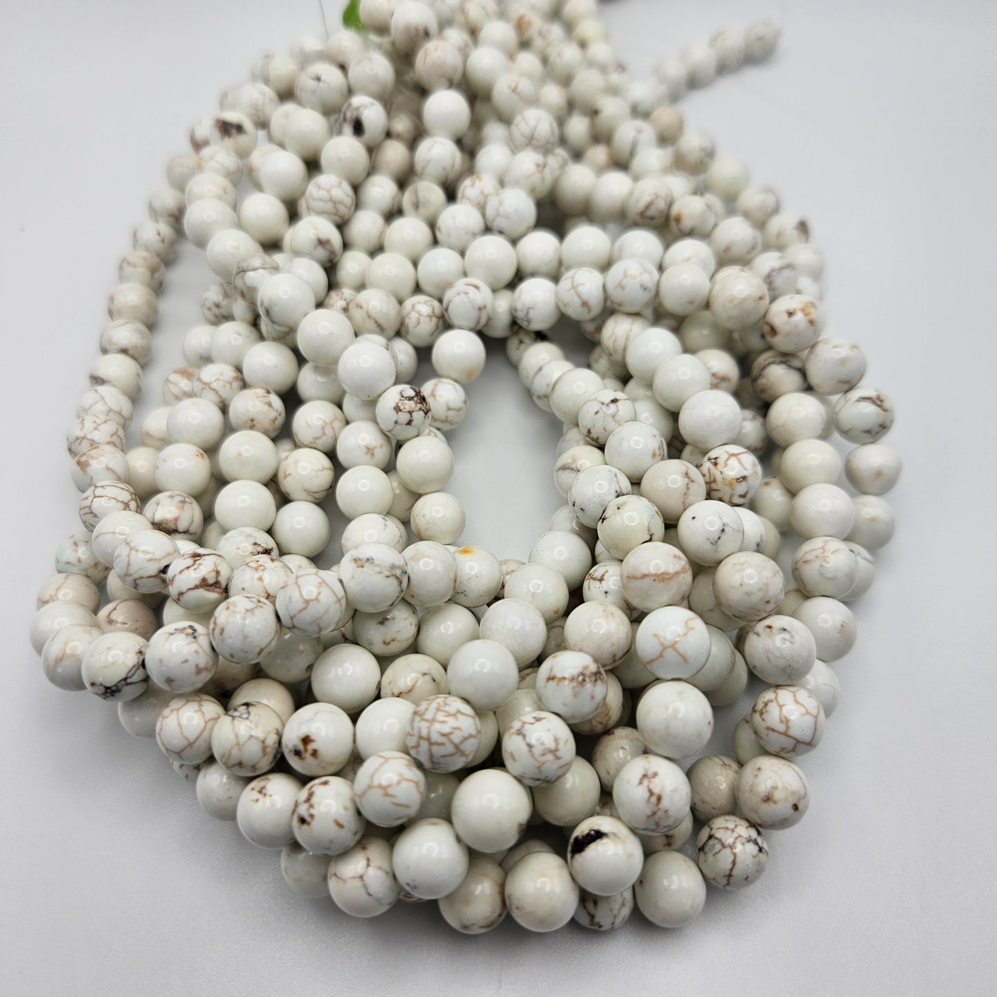8mm White Buffalo Round Bead Strand.