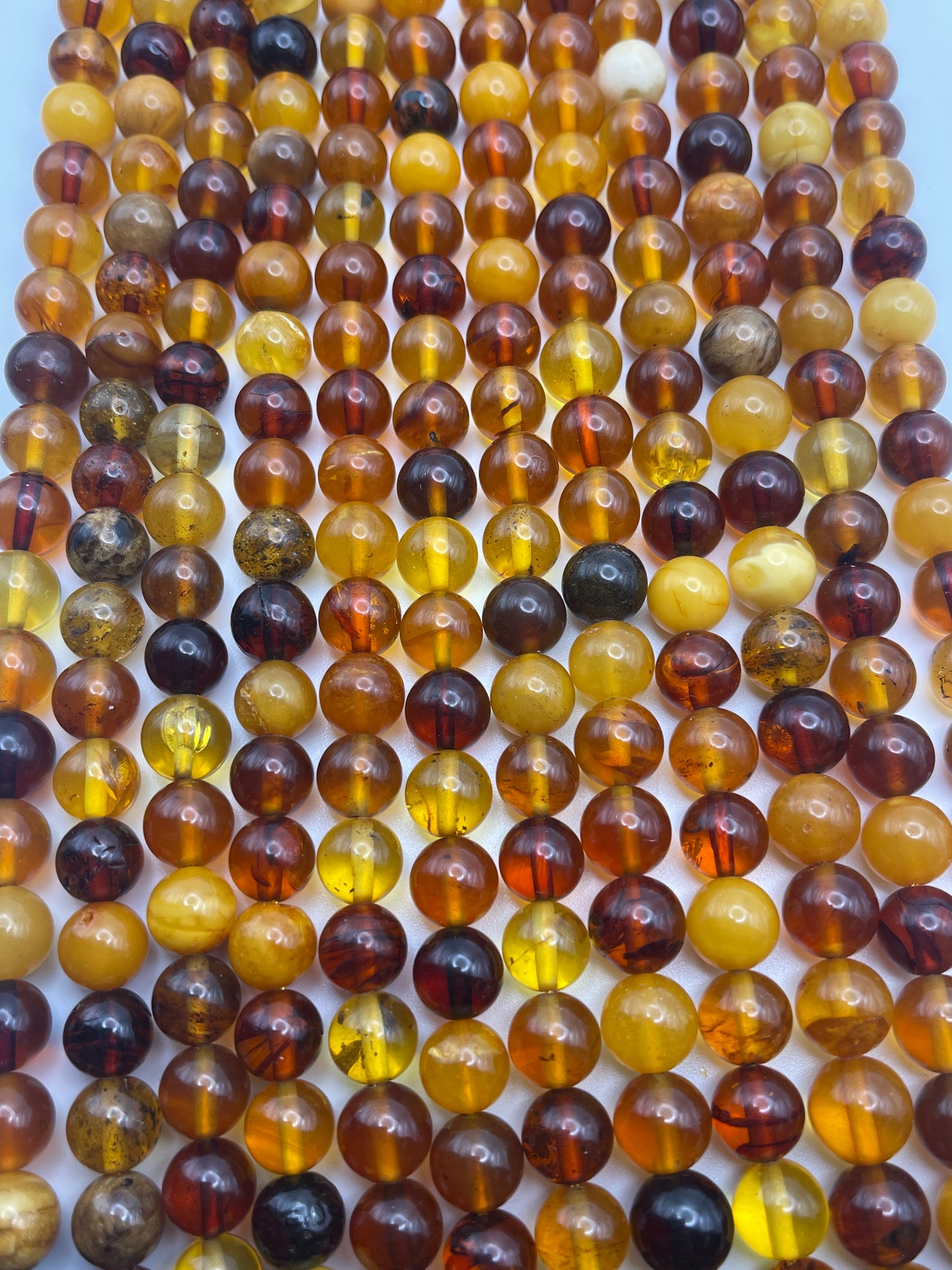 9mm Amber Round Mixed Bead Strand.