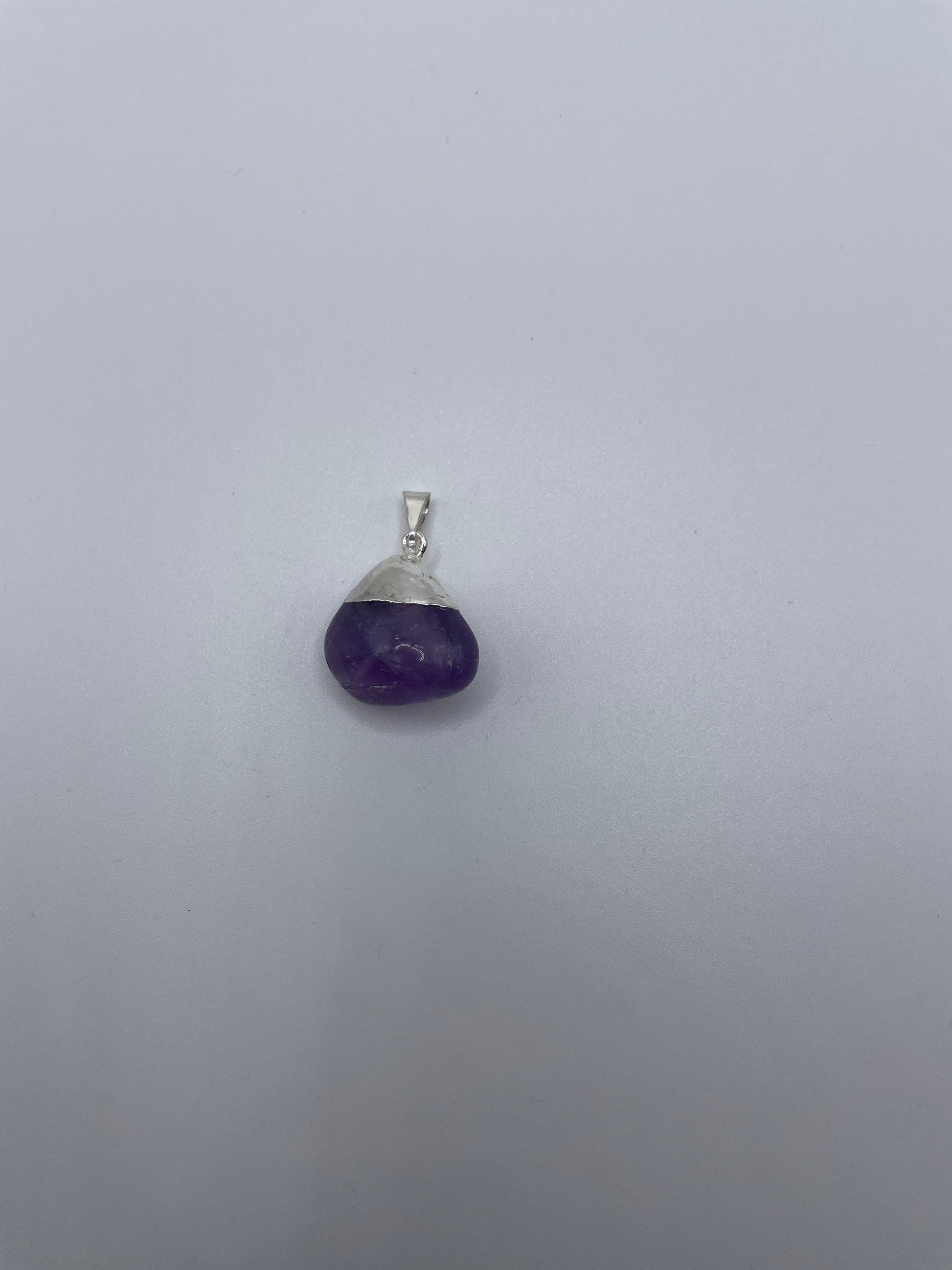 Amethyst Pendant With Silver Plated Bail.