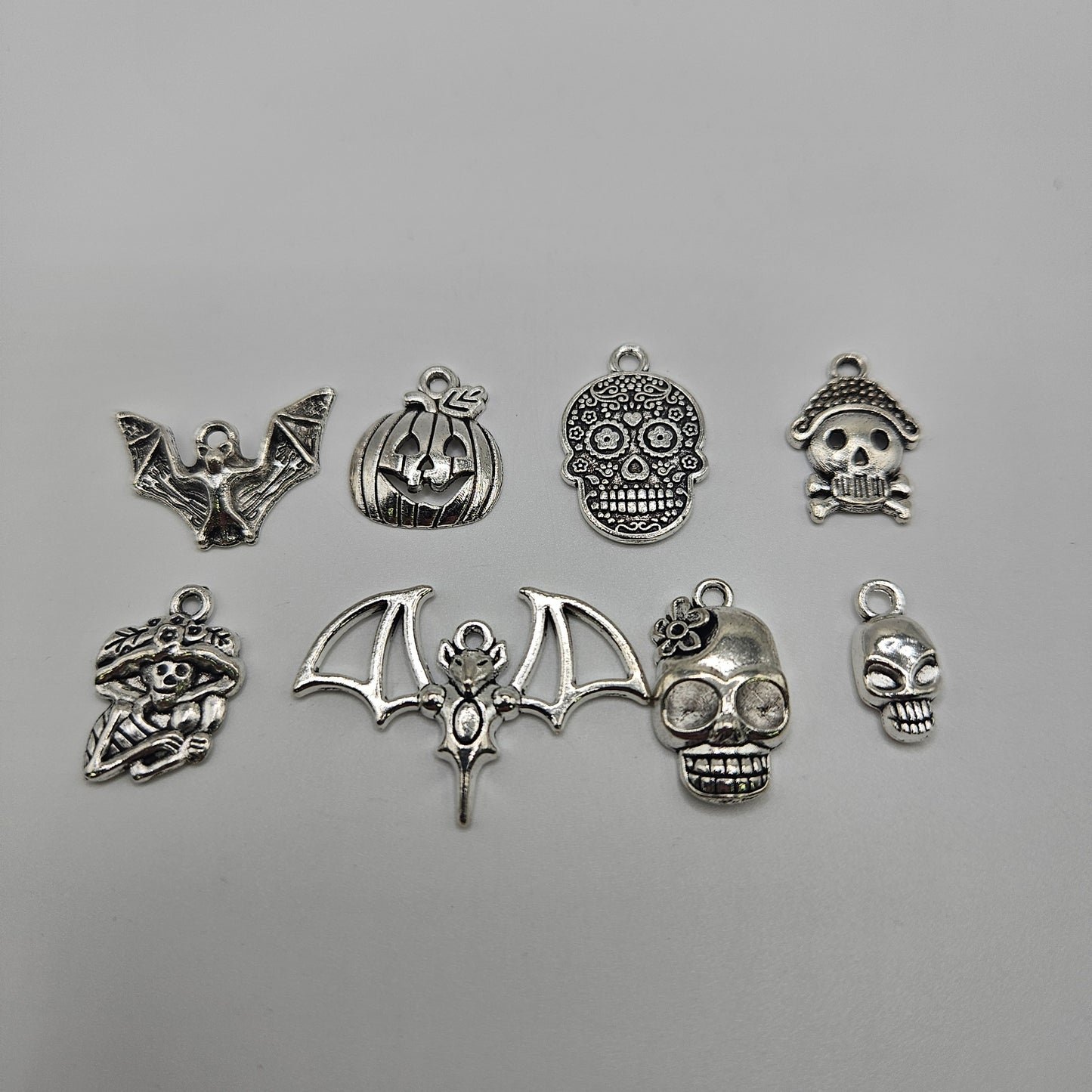 Assorted Halloween Pewter Charms.