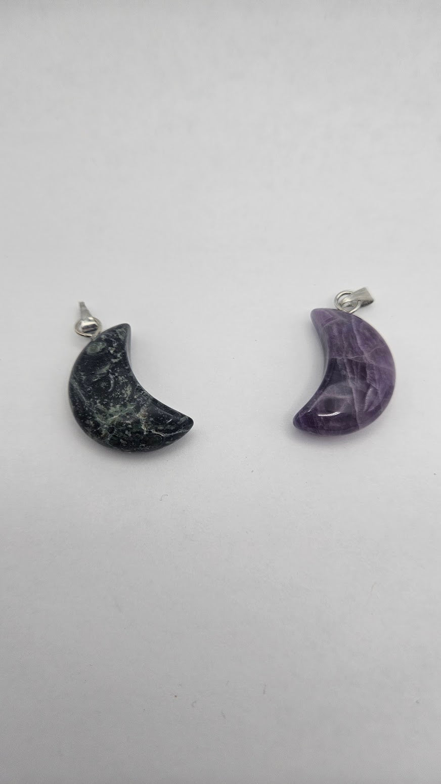 Assorted Moon Pendants.