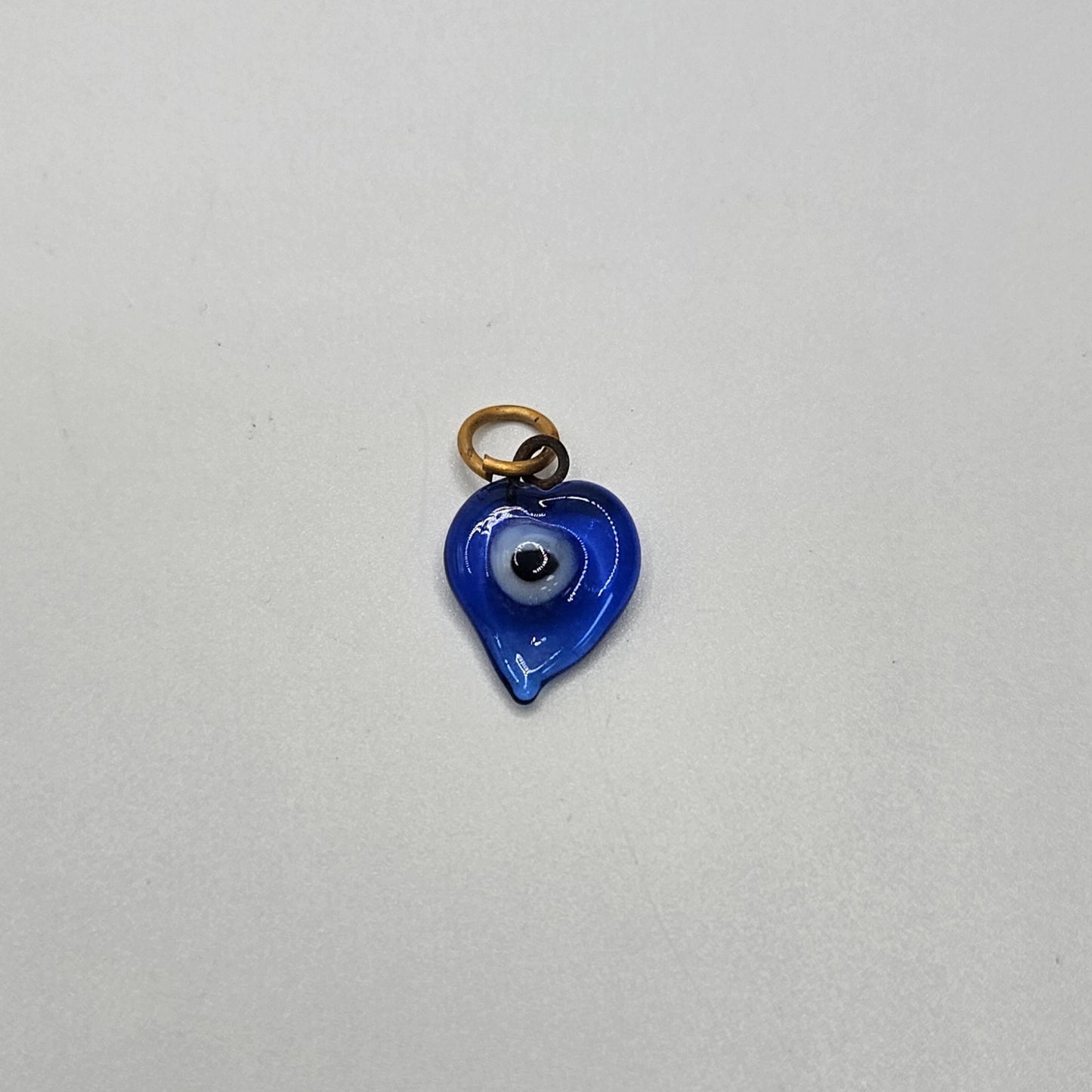 Blue Glass Heart Evil Eye Charm.