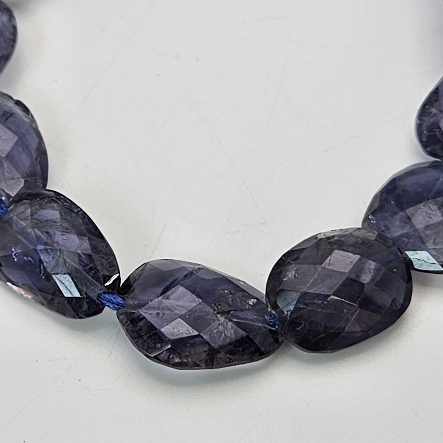 Faceted Iolite Single Bead.