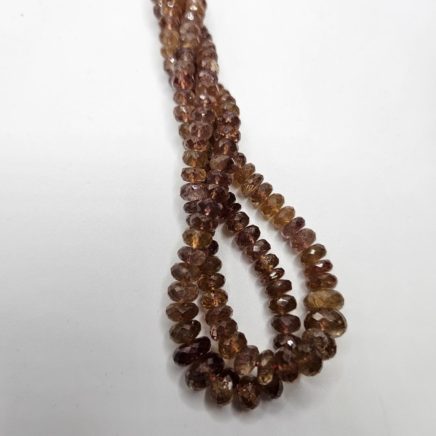 Graduated Andalusite Faceted Strand.