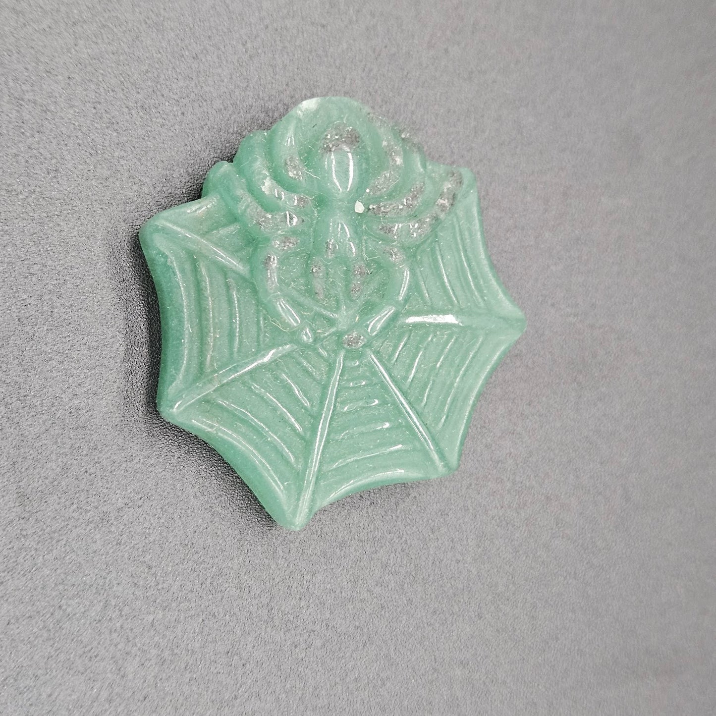 Green Aventurine Spider On Web.