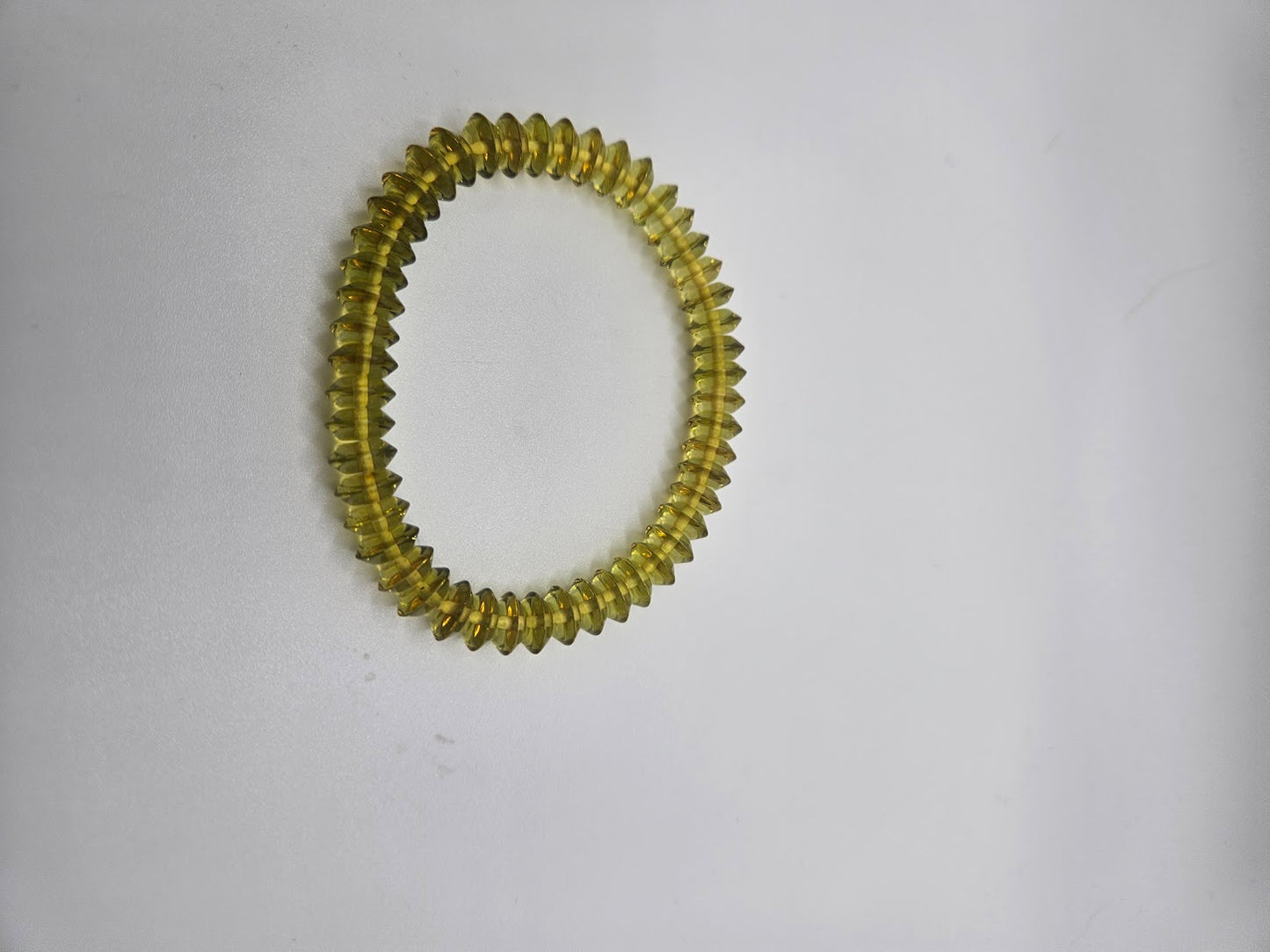 Green Saucer Amber Stretch Bracelet.