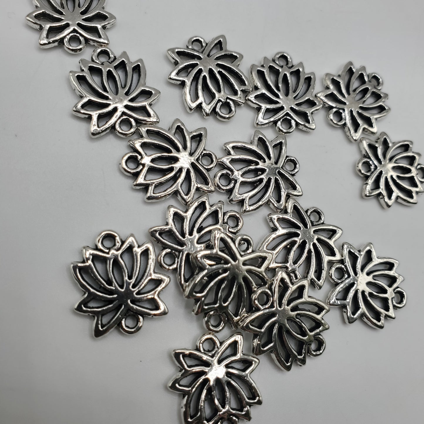 Pewter Lotus Charm.
