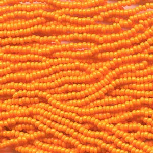 SIZE 11 CZECH GLASS SEED BEADS LIGHT ORANGE 6 STRING HANK.