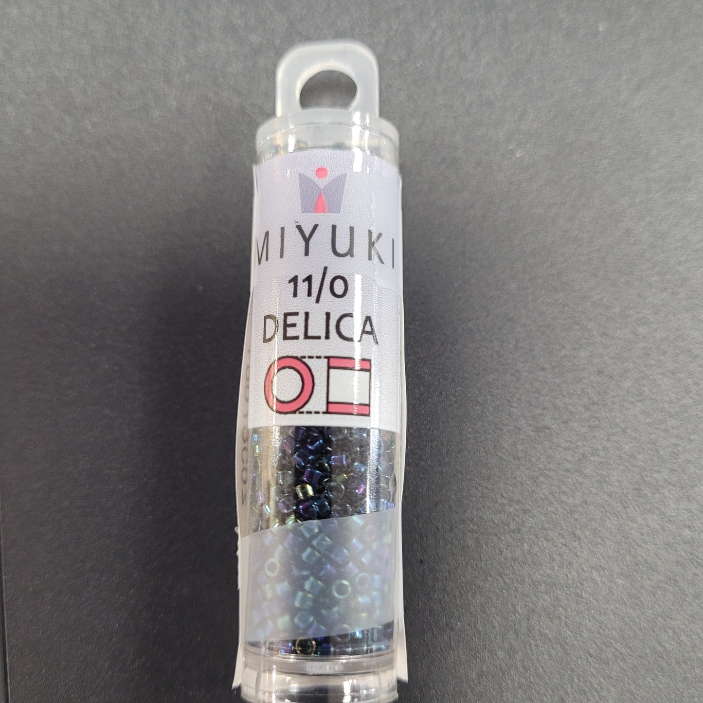 SIZE 11 DELICA SEED BEAD BLUE IRIS COLOR.