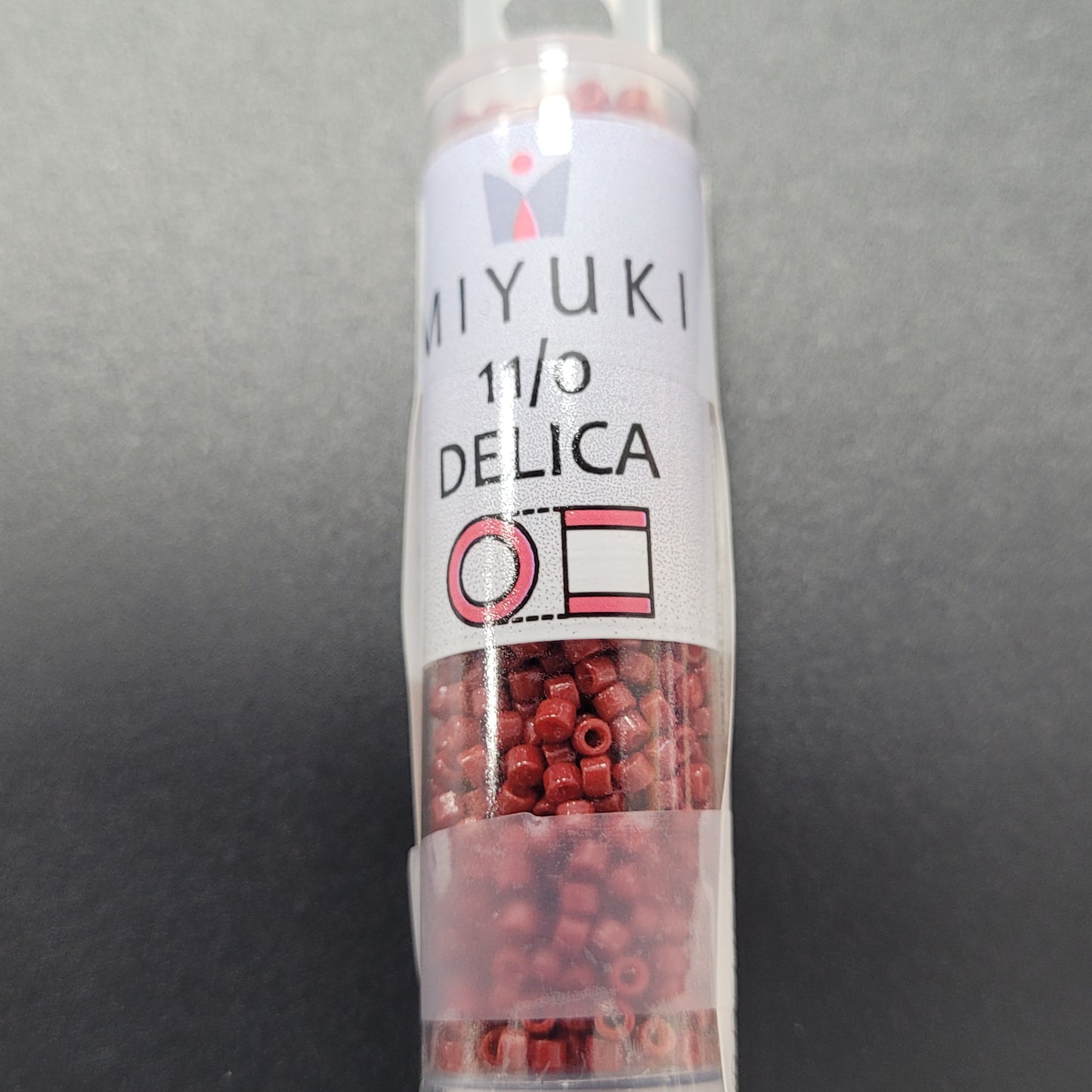 SIZE 11 Delica Duracoat Seed Bead In Opaque Jujube Color.