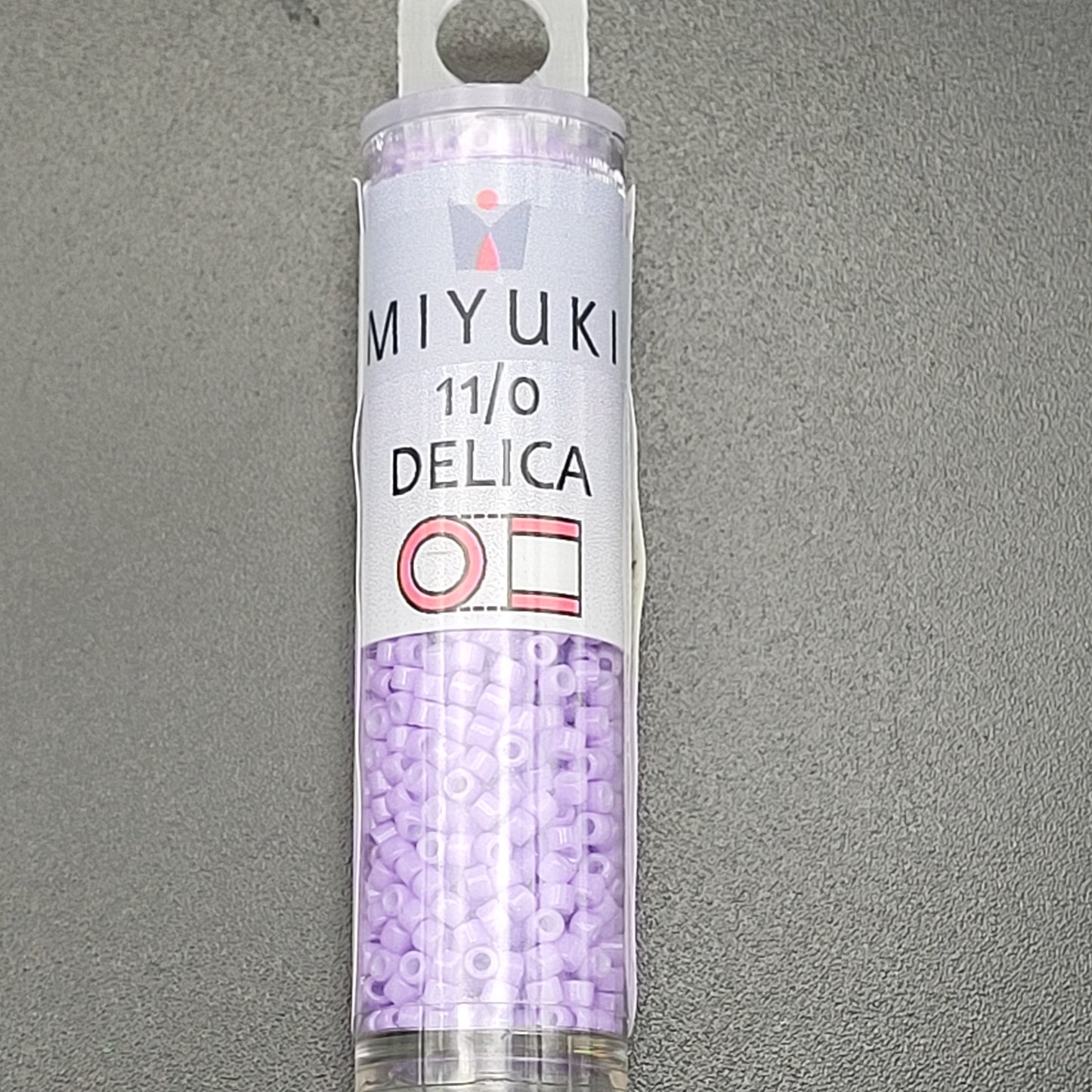 SIZE 11 Delica Duracoat Seed Bead In Opaque Columbine Color.