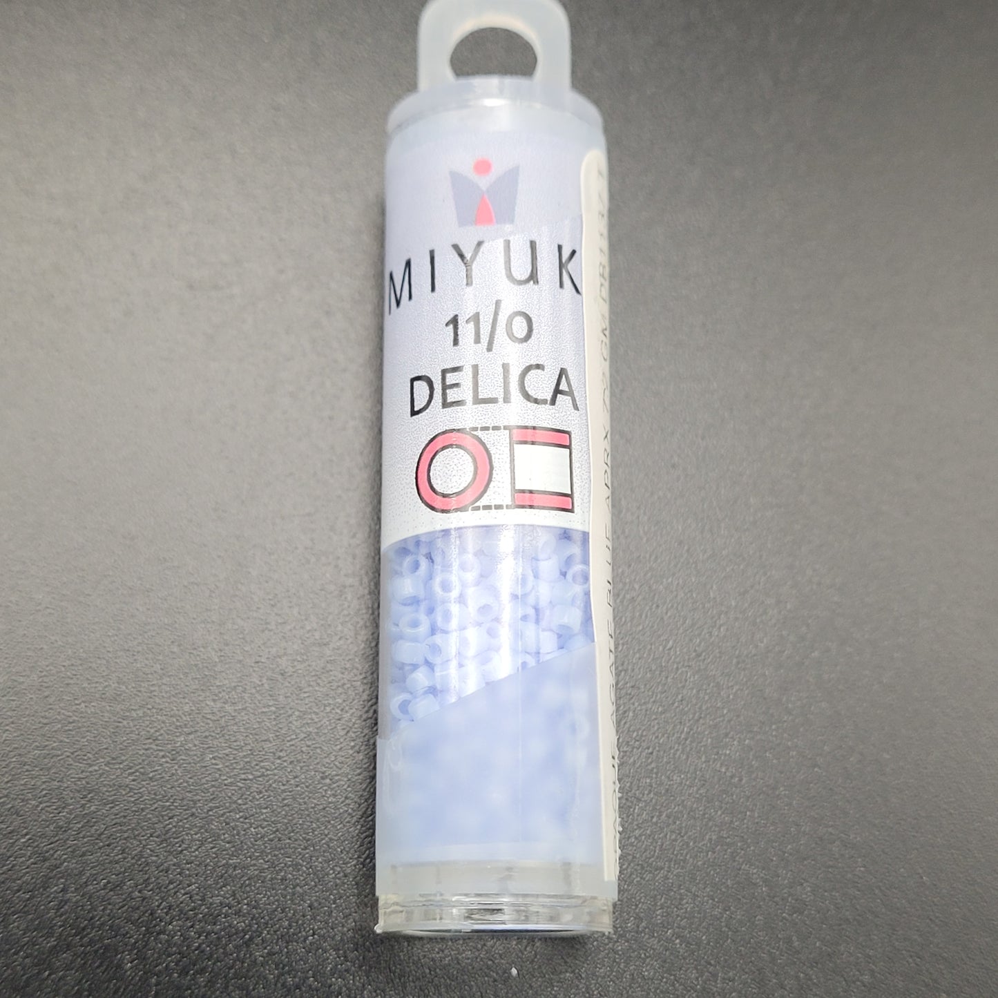 SIZE 11 SEED BEAD OPAQUE AGATE BLUE COLOR.