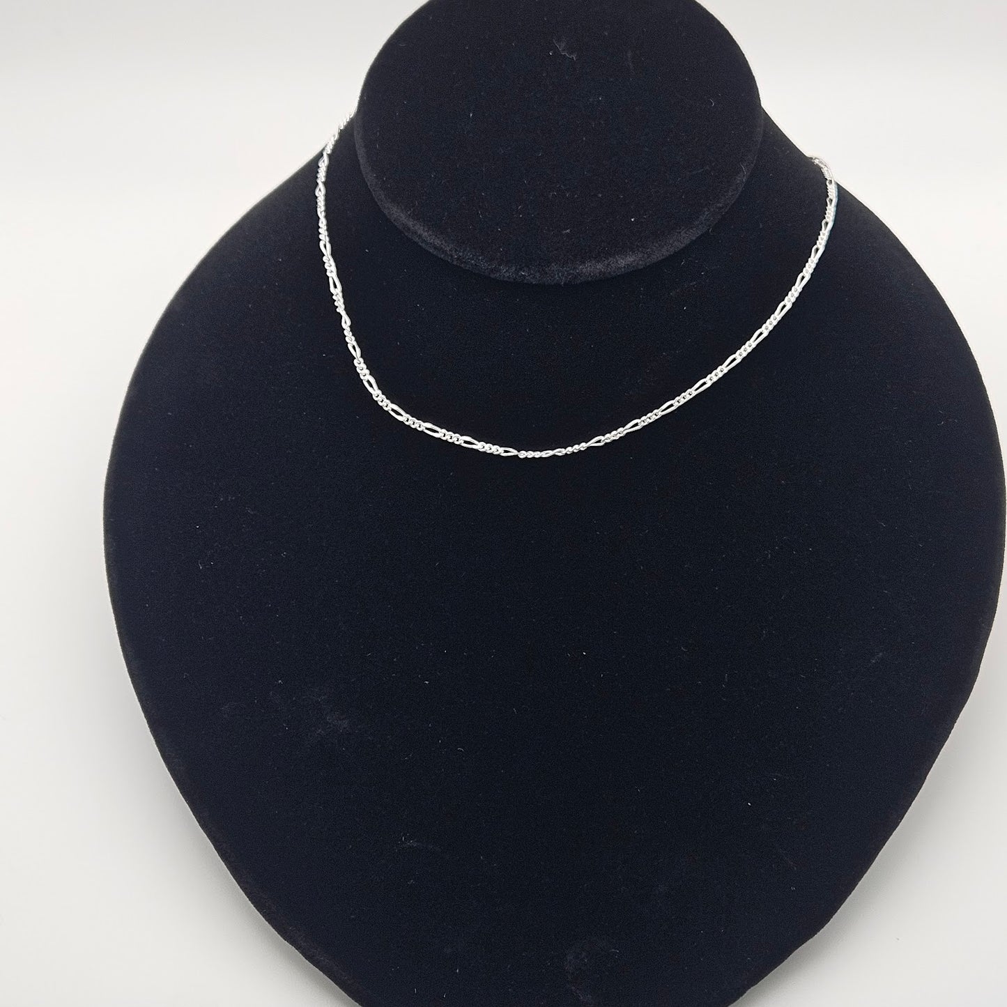 Sterling silver 16in three plus one figaro.