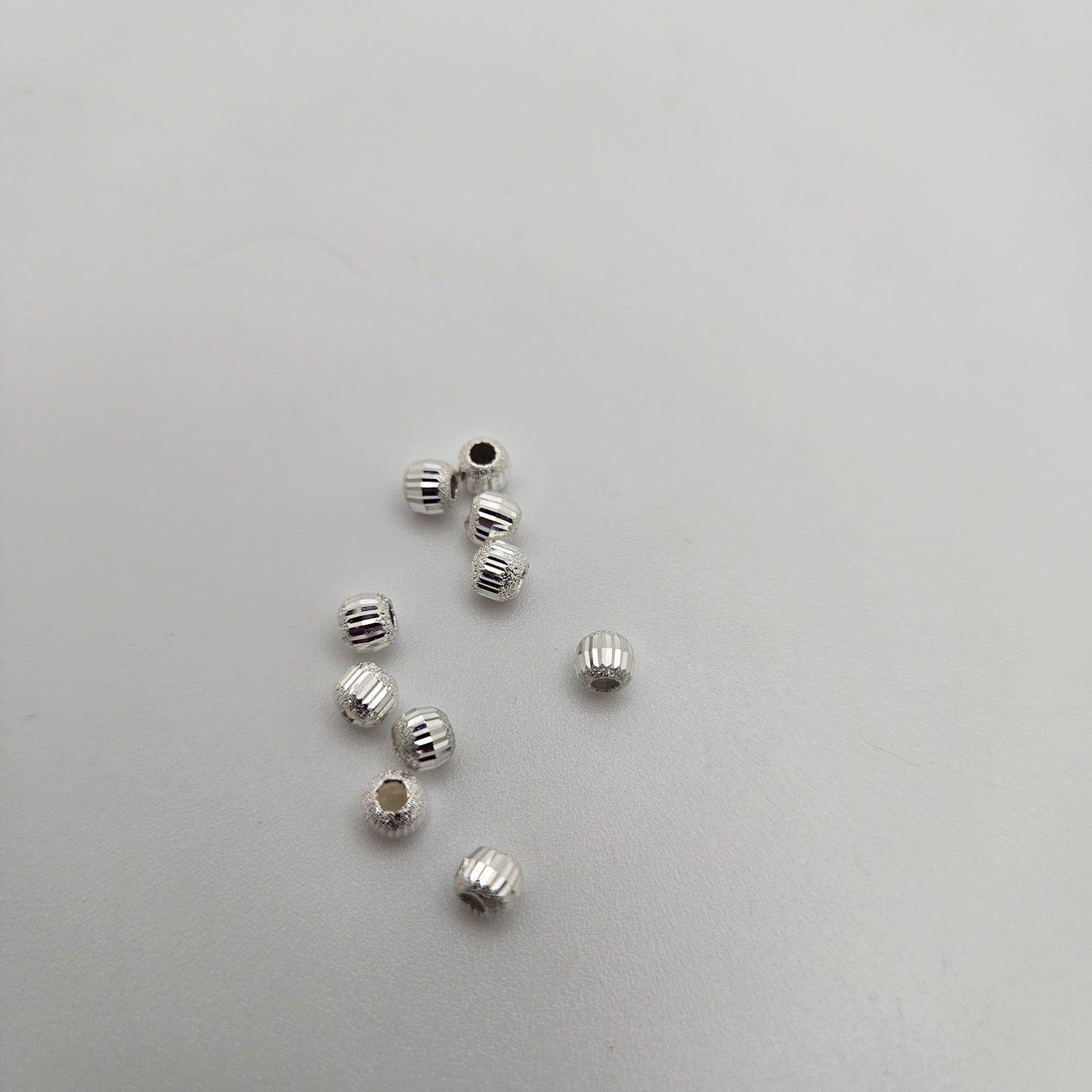 Sterling Silver 4mm Fancy Laser Corrugated Single.