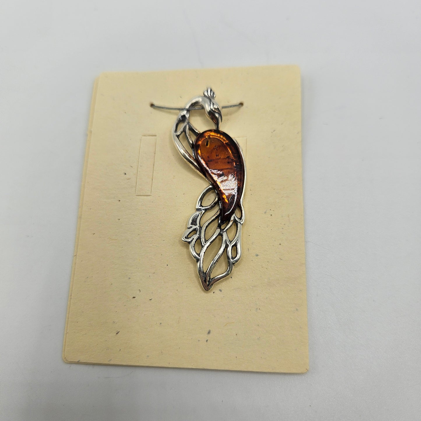 Sterling Silver Amber Peacock Pendant.
