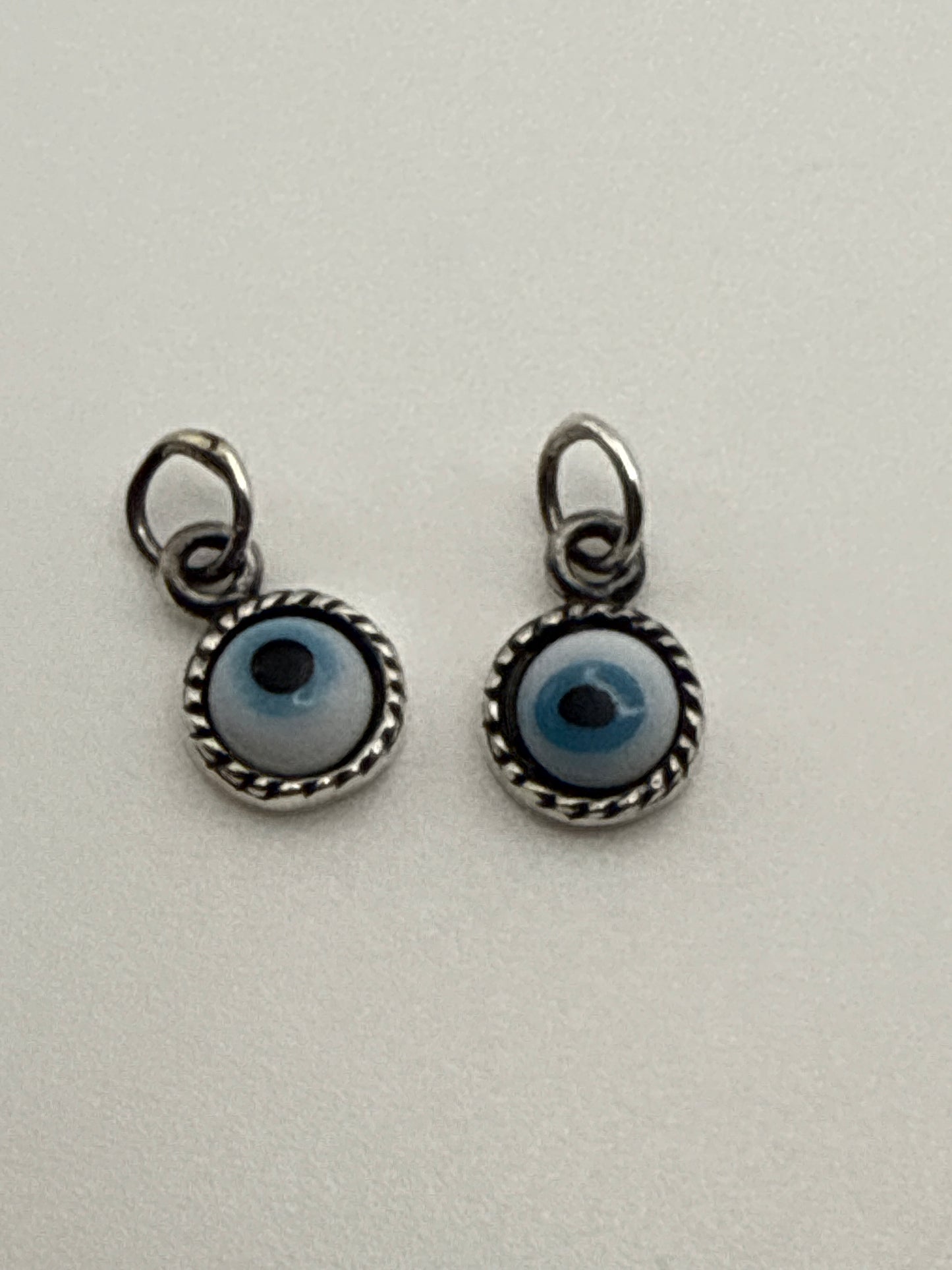 Sterling Silver Charm Evil Eye Glass White Eye Twisted Rope Bezel.