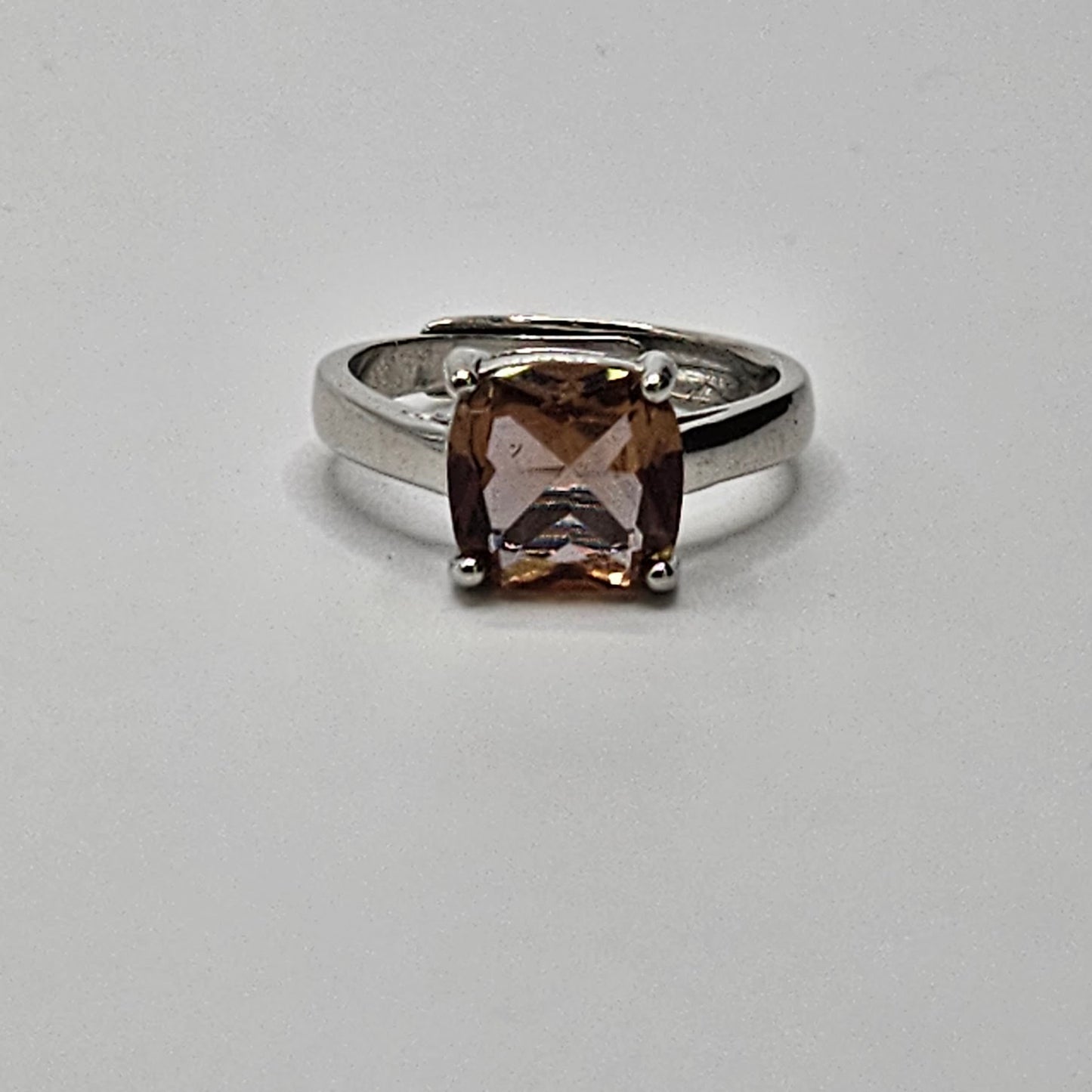 Sterling Silver Color Change Prong Set Gemstone Square Ring.