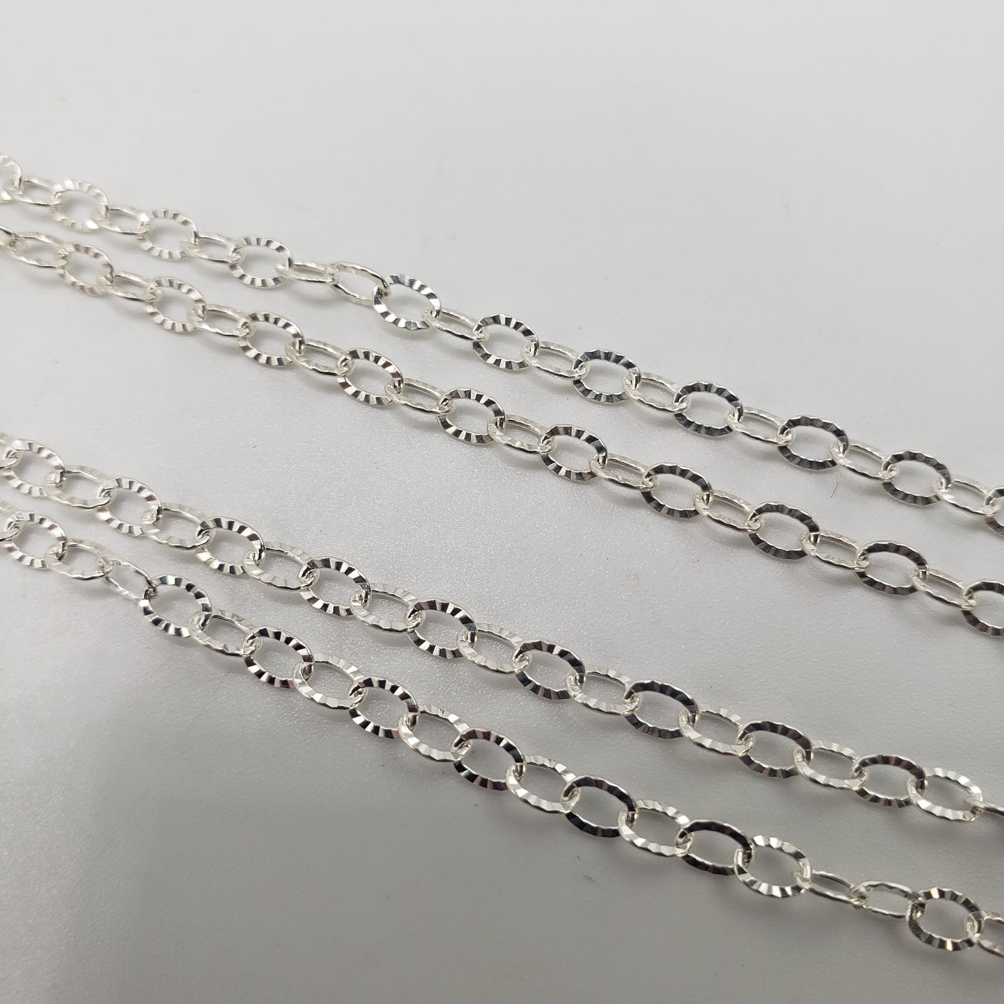 Sterling Silver Diamond Cut Oval Link Chain By the Foot.