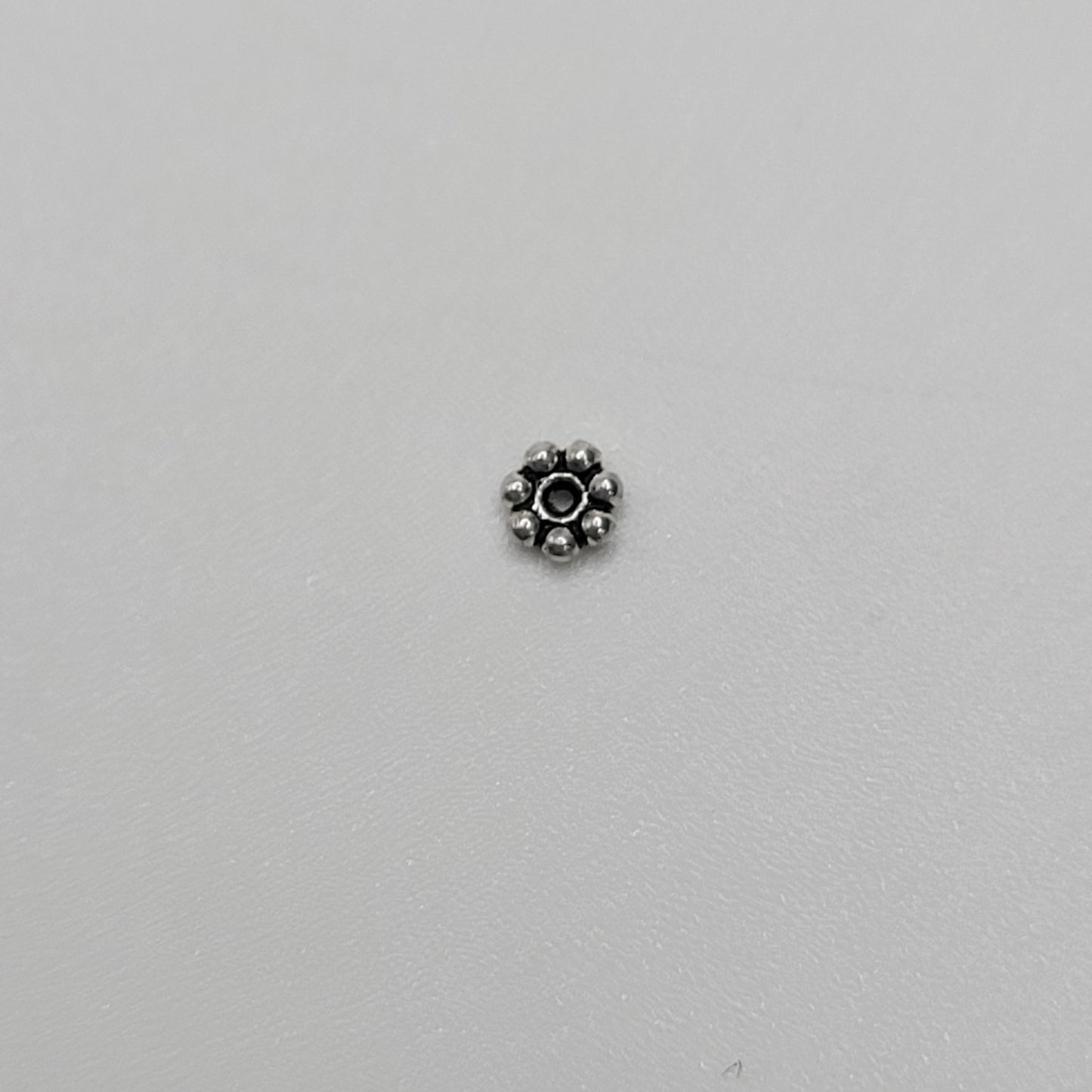 Sterling Silver Extra Small 1mm Daisy Spacer.