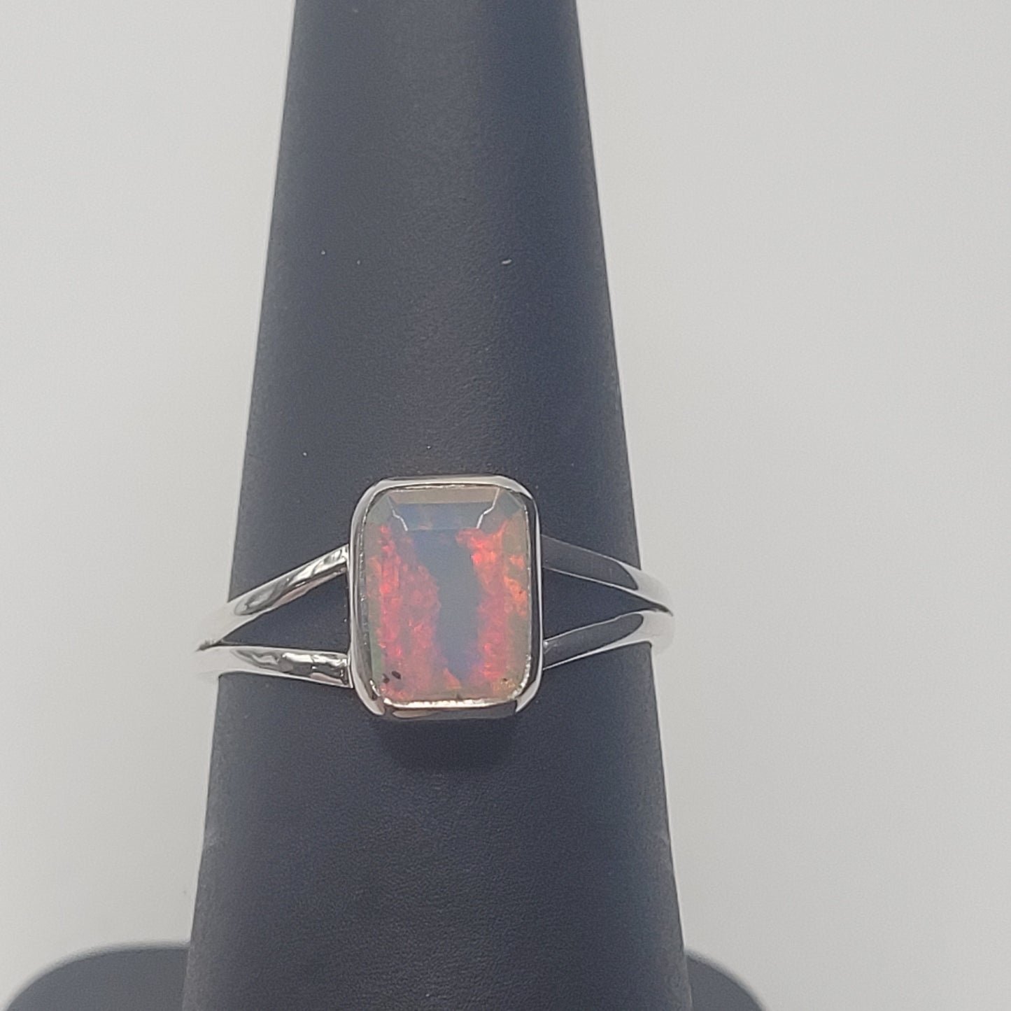 Unique Sterling Silver Faceted Ethiopian Opal Bezel Ring. Size, Shape, and Color of Opal Will Vary.