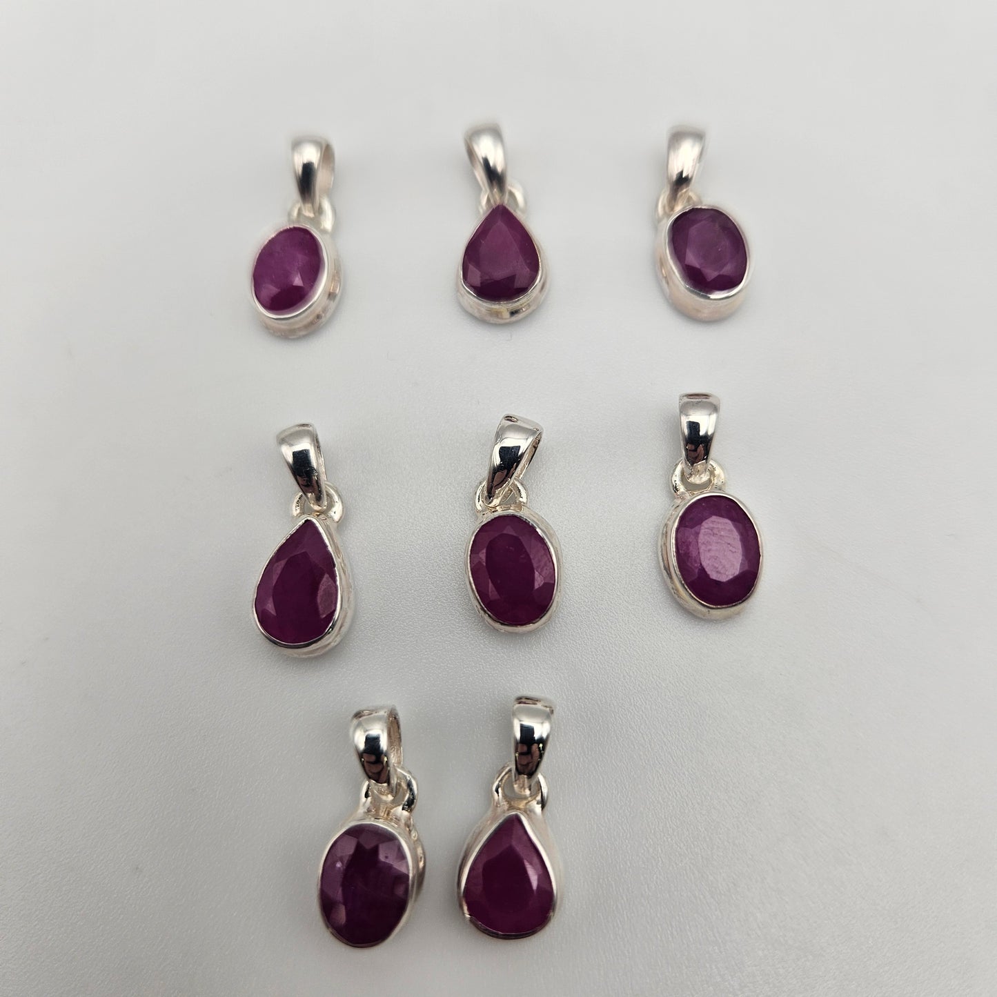 Sterling Silver Faceted Ruby Bezel Pendant.