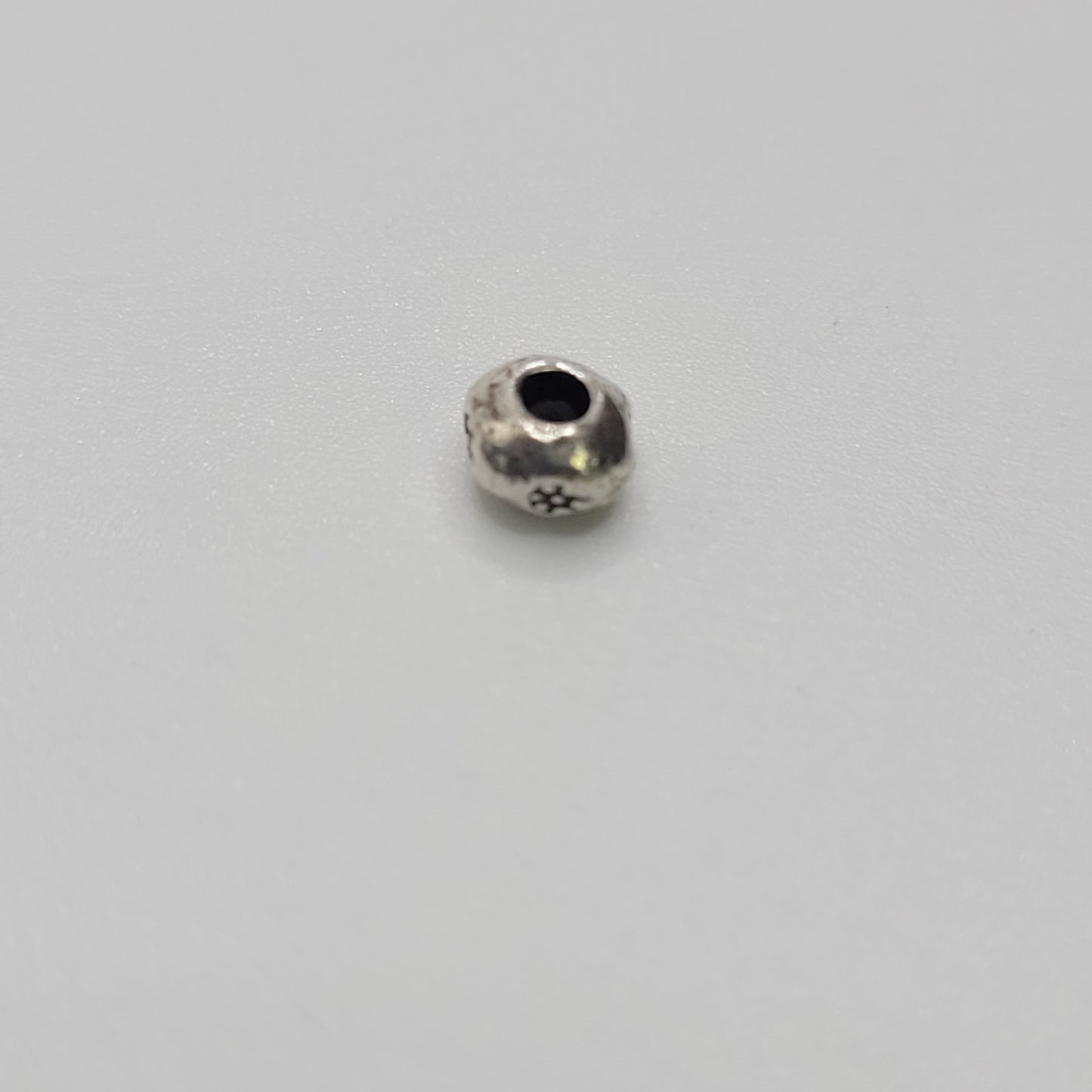 Sterling Silver Flower Donut Spacer Bead.