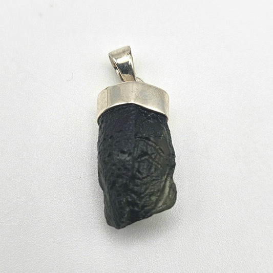 Sterling Silver Freeform Moldavite Pendant 1 inch.