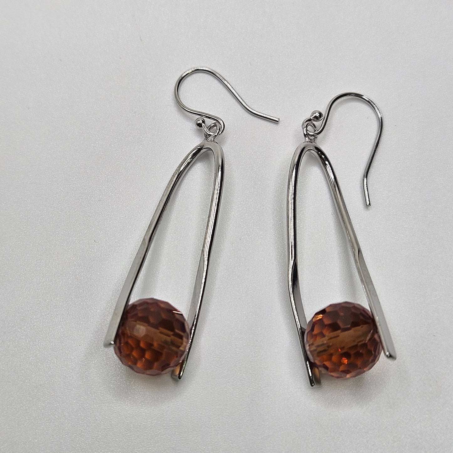 Sterling Silver Lab Grown Alexandrite Twisted Earrings.