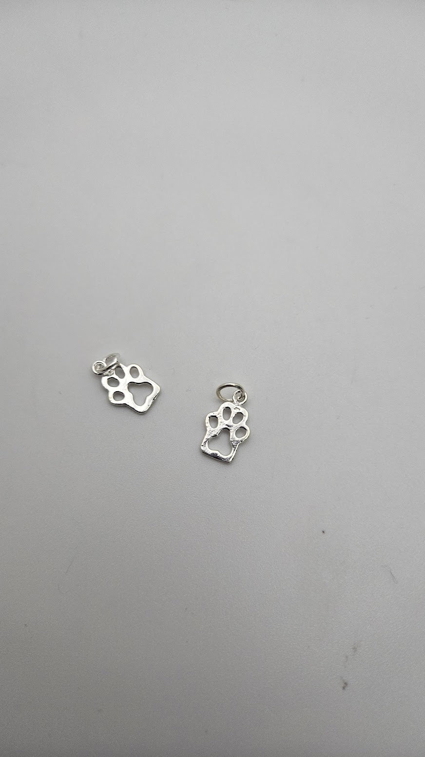 Sterling Silver Paw Charm Single.
