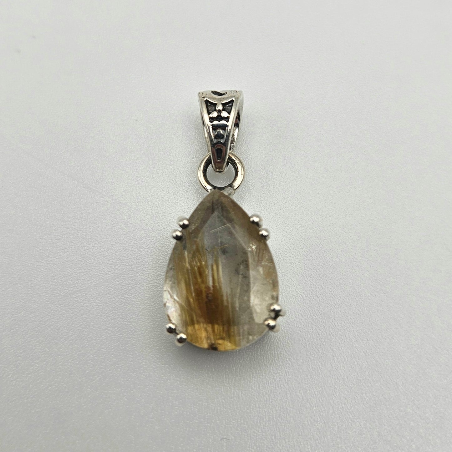 Sterling Silver Pear Shaped Gold Rutilated Quartz Pendant 1 inch.