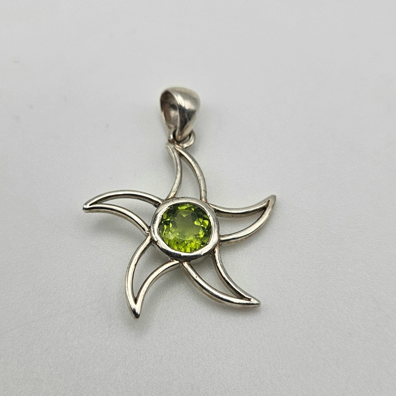 Sterling Silver Peridot Star Pendant 1 inch.