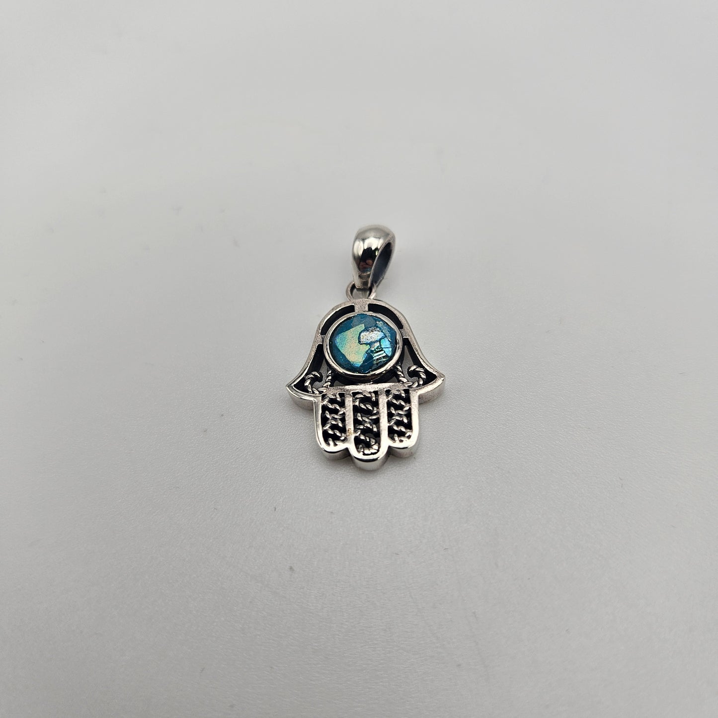 Sterling Silver Roman Glass Hamsa Round Pendant.