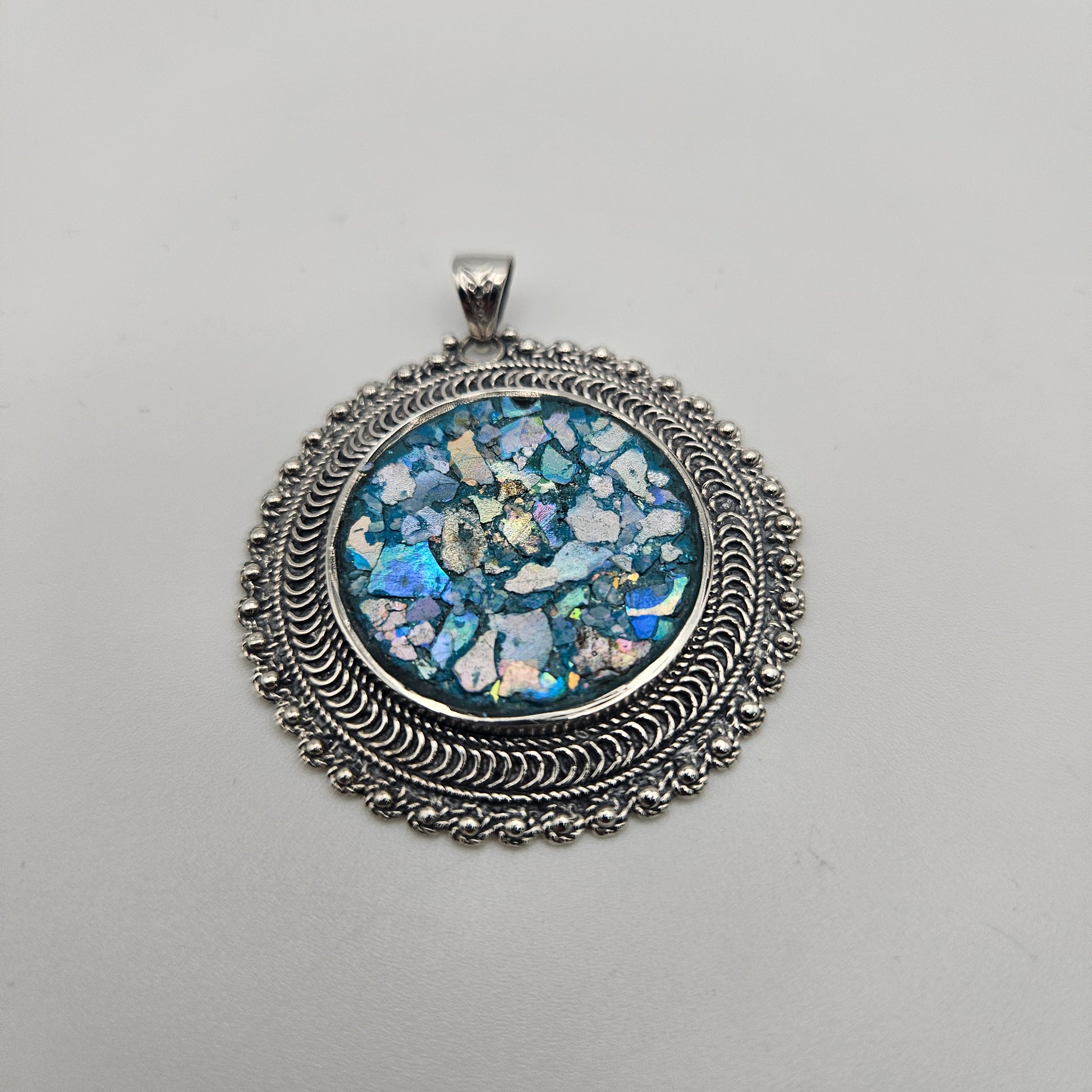Sterling Silver Roman Glass Round Ornate Pendant.