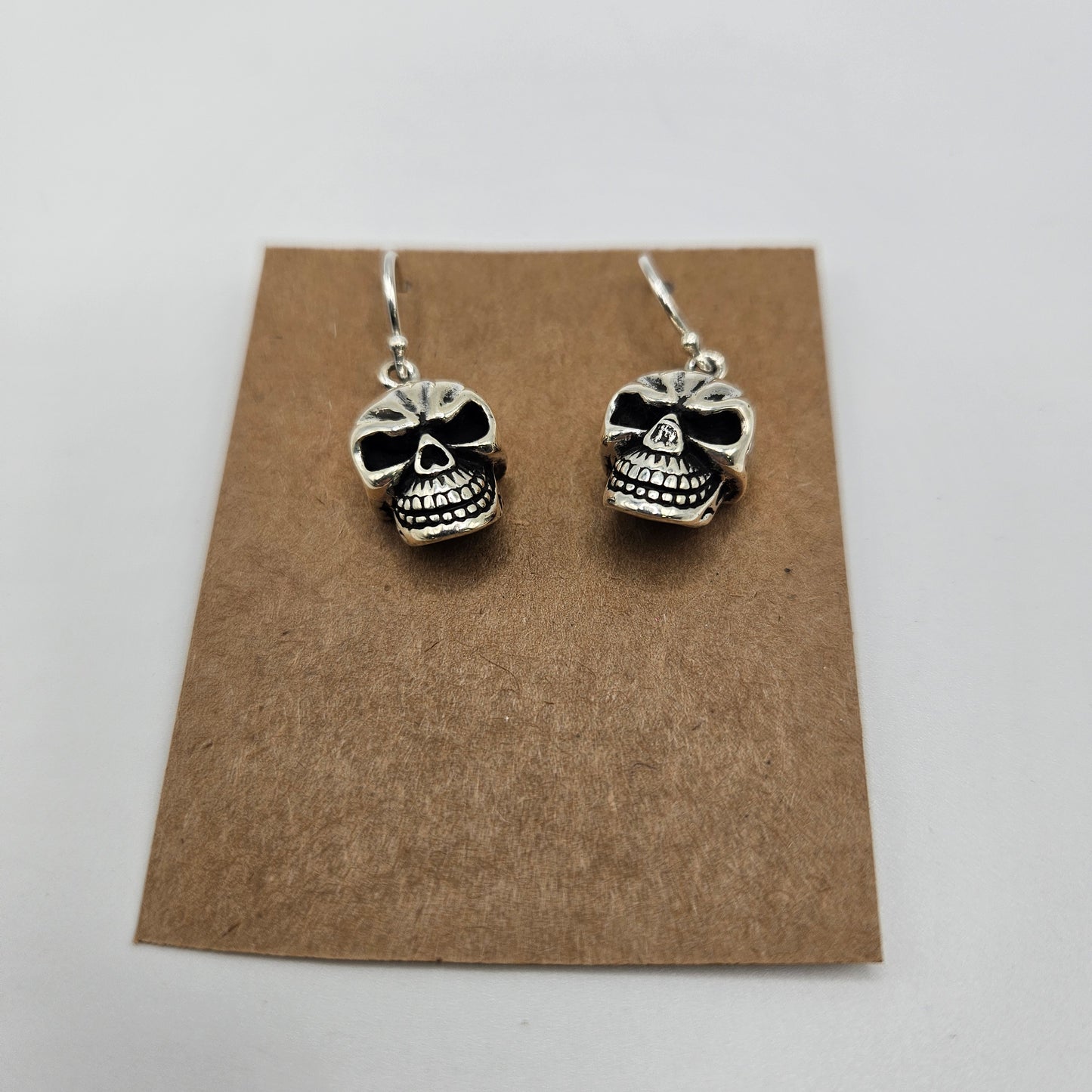 Sterling Silver Skull Earrings.