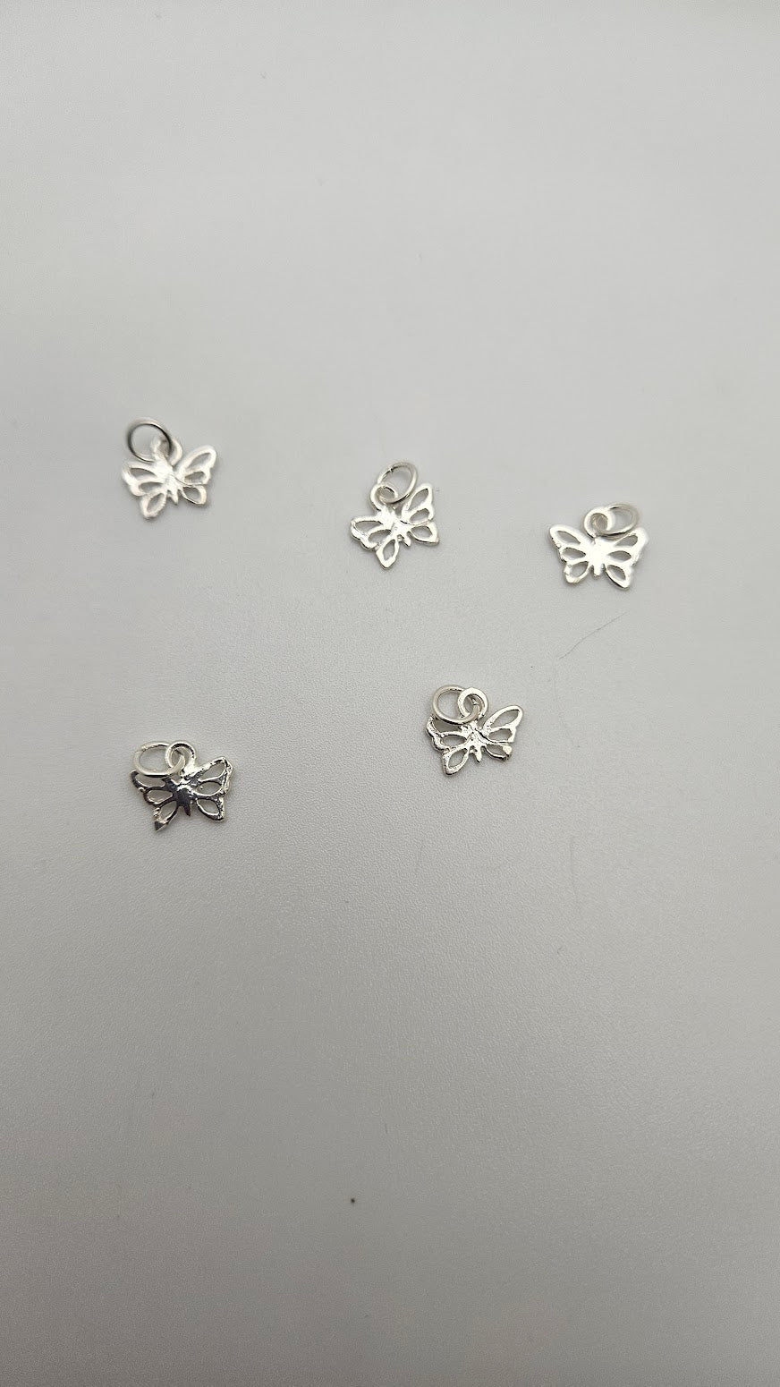 Sterling Silver Small Butterfly Charm Single.