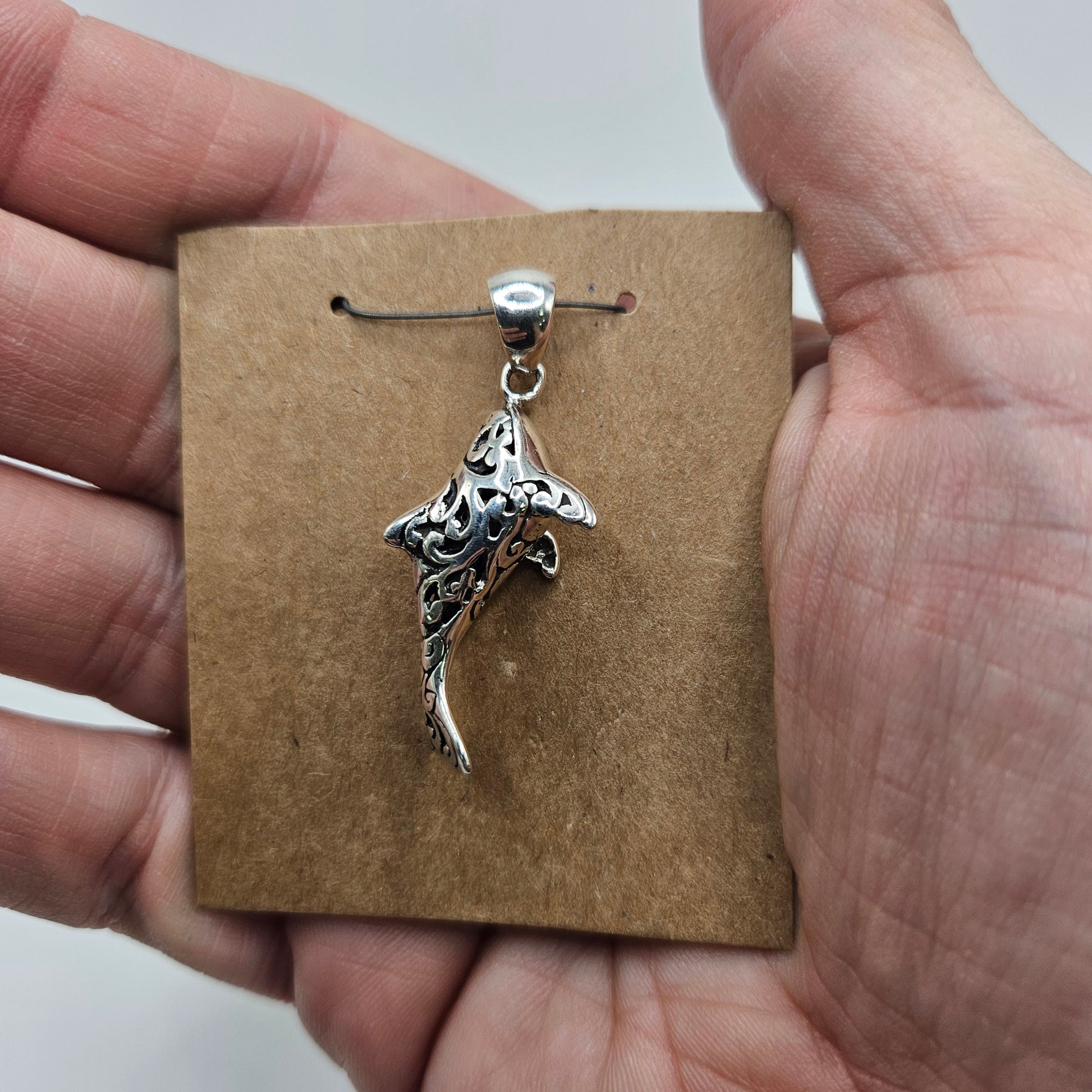 Sterling Silver Small Dolphin Pendant.