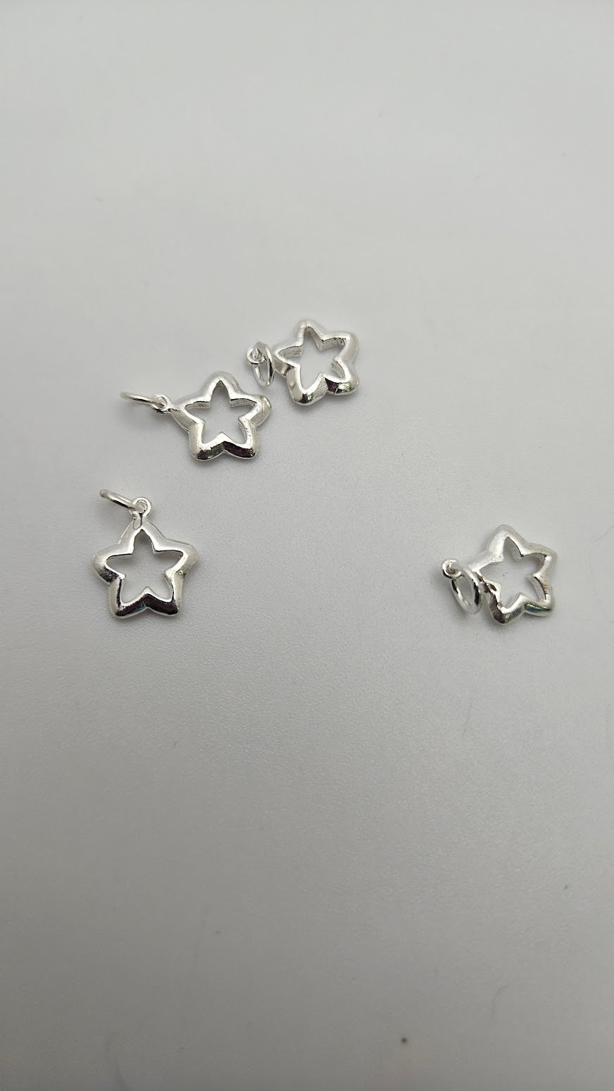 Sterling Silver Star Charm Single.