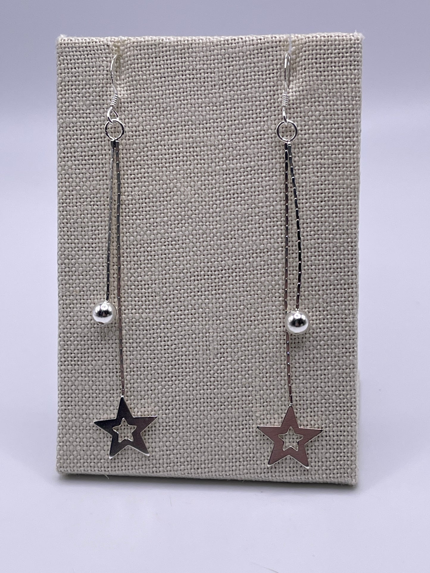Sterling Silver Star and Ball Dangle Earrings.