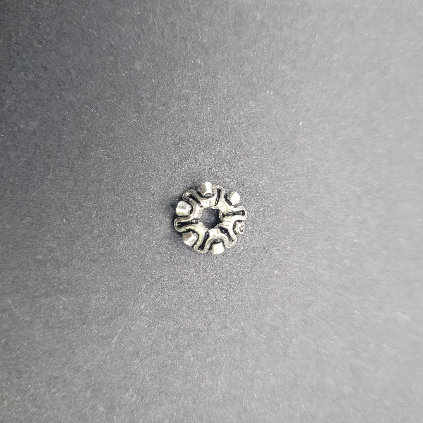 Sterling Silver Wavy Wheel Spacer Bead.