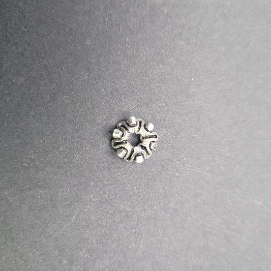 Sterling Silver Wavy Wheel Spacer Bead.