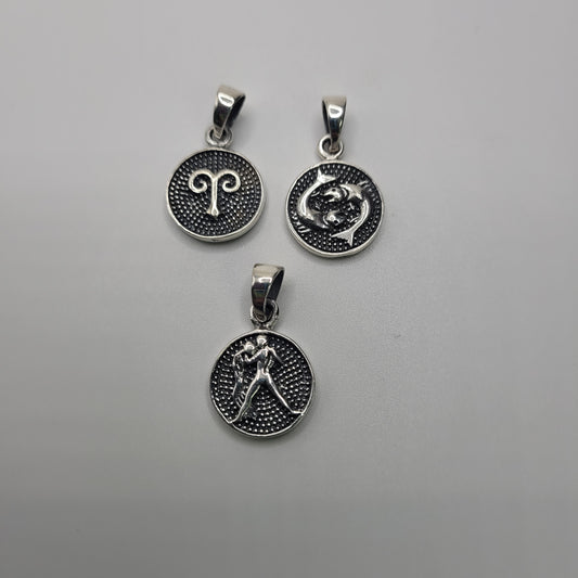 Sterling Silver Zodiac Pendants. Chosen Randomly. If you need a specific Zodiac sign please contact us or come into the shop.