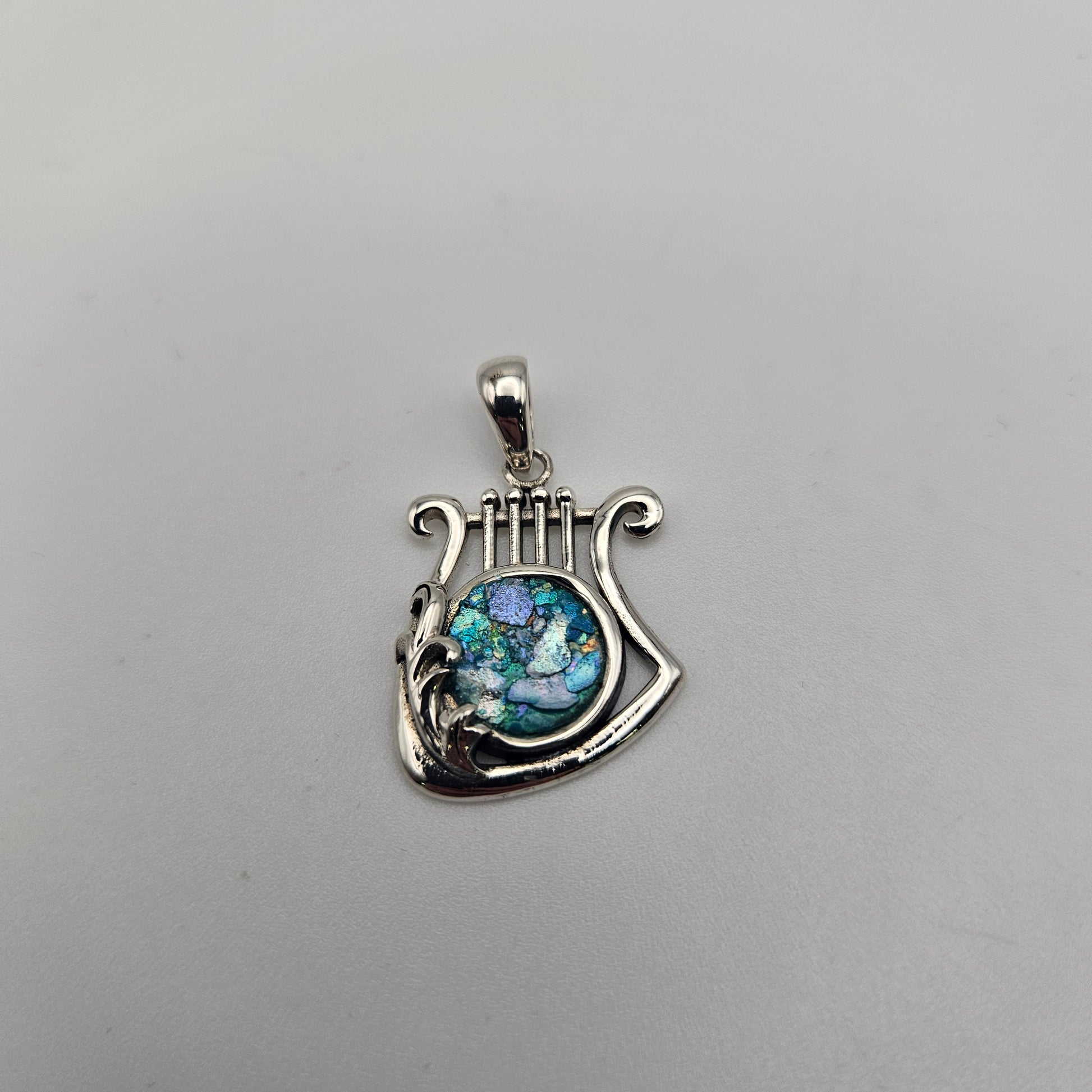 Sterling Silver Roman Glass Round Harp Pendant.