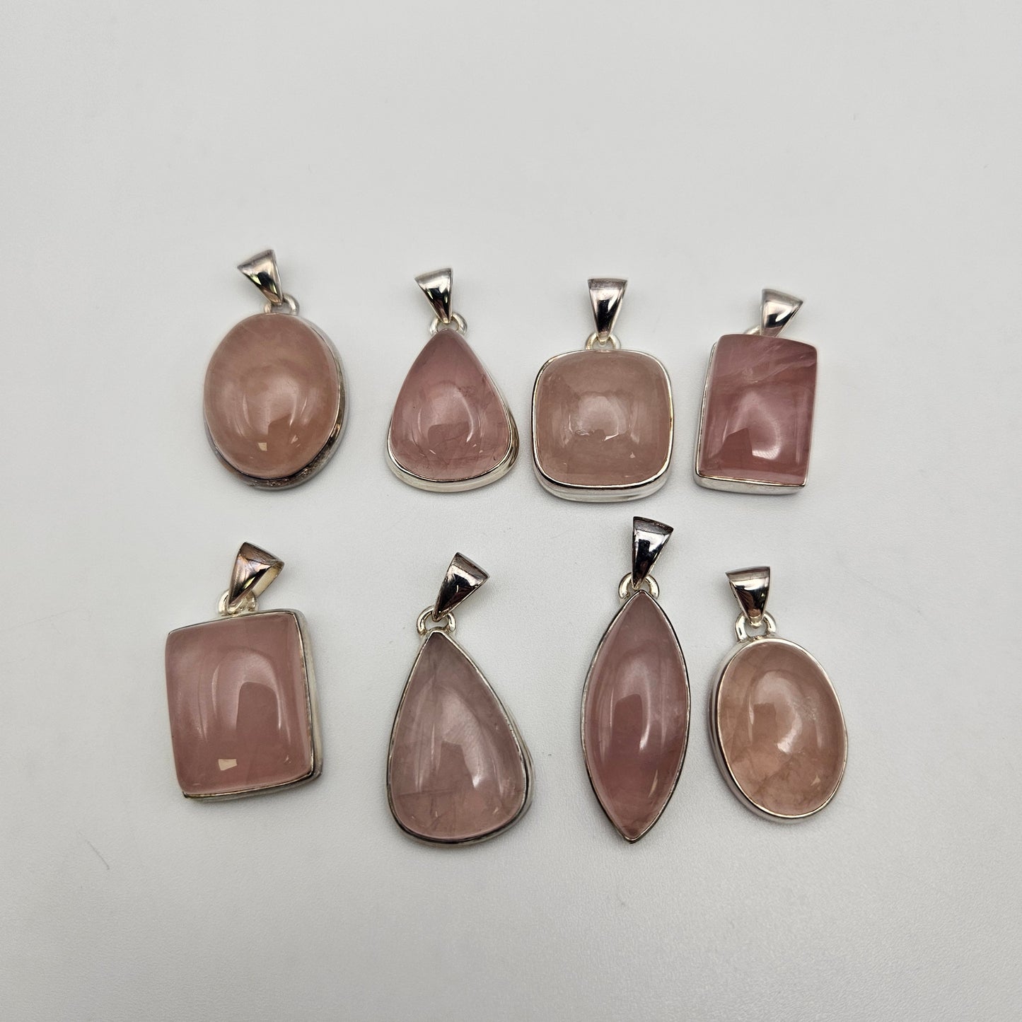 Sterling Silver Small Rose Quartz Bezel Pendant.